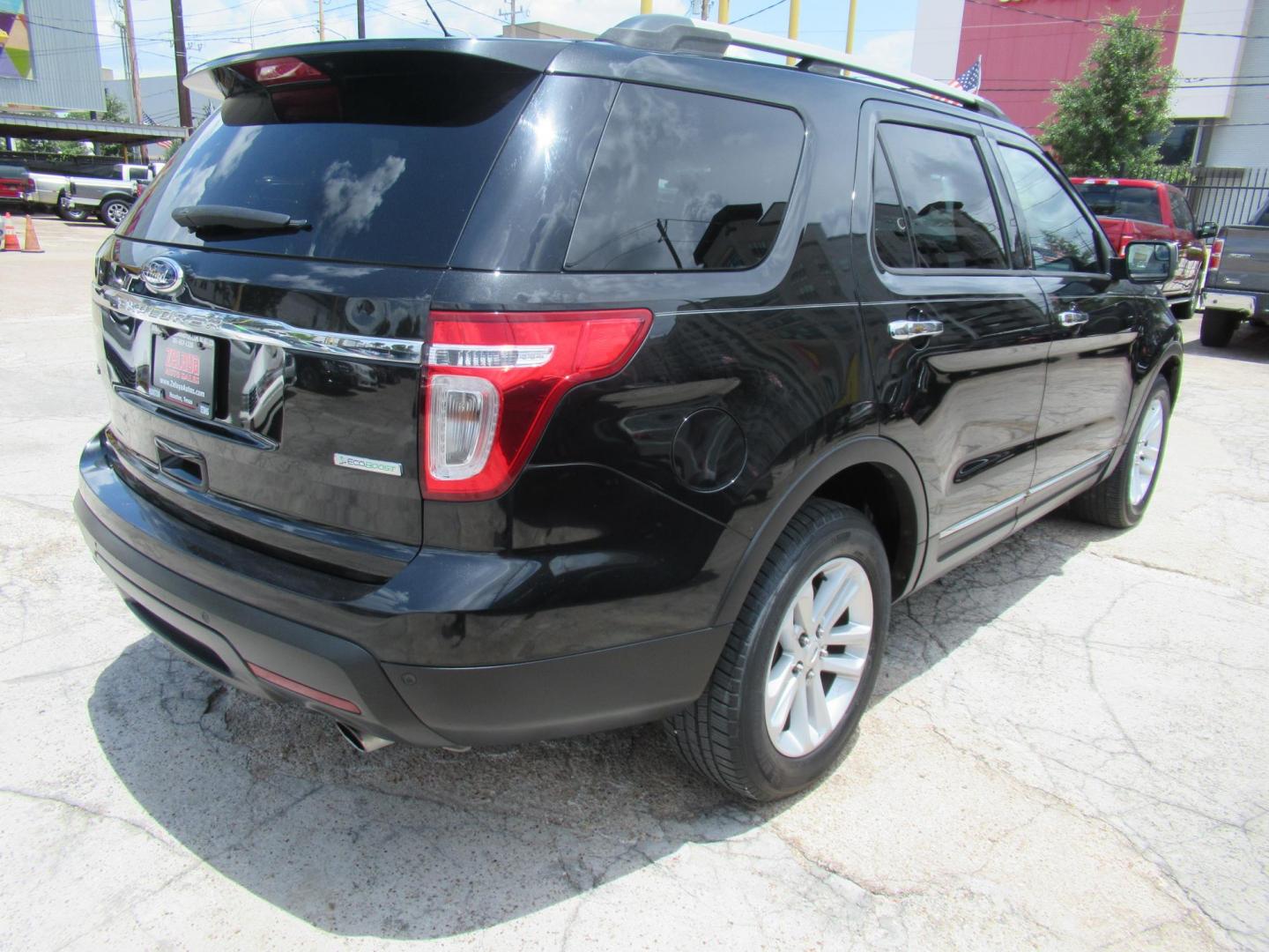 2013 Black /Black Ford Explorer XLT FWD (1FM5K7D99DG) with an 2.0L L4 DOHC 16V TURBO engine, 6-Speed Automatic transmission, located at 1511 North Shepherd Dr., Houston, TX, 77008, (281) 657-1221, 29.798361, -95.412560 - 2013 FORD EXPLORER XLTVIN: 1FM5K7D99DGA016094 DOOR WAGON-SPORT UTILITY2.0L I4 F DOHC 16VGASOLINEFRONT WHEEL DRIVE - Photo#20