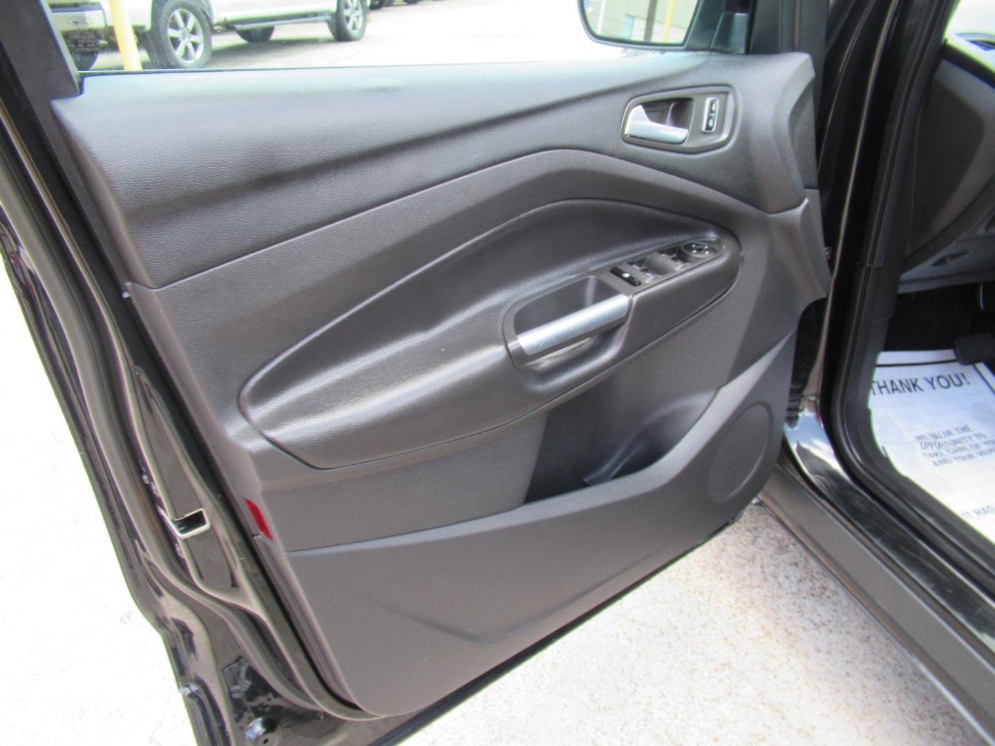 2014 Black /Black Ford Escape SE 4WD (1FMCU9GXXEU) with an 1.6L L4 DOHC 16V engine, Automatic transmission, located at 1511 North Shepherd Dr., Houston, TX, 77008, (281) 657-1221, 29.798361, -95.412560 - 2014 FORD ESCAPE SEVIN: 1FMCU9GXXEUC319764 DOOR WAGON-SPORT UTILITY1.6L I4 F DOHC 16VGASOLINEFRONT WHEEL DRIVE W- 4X4 - Photo#5