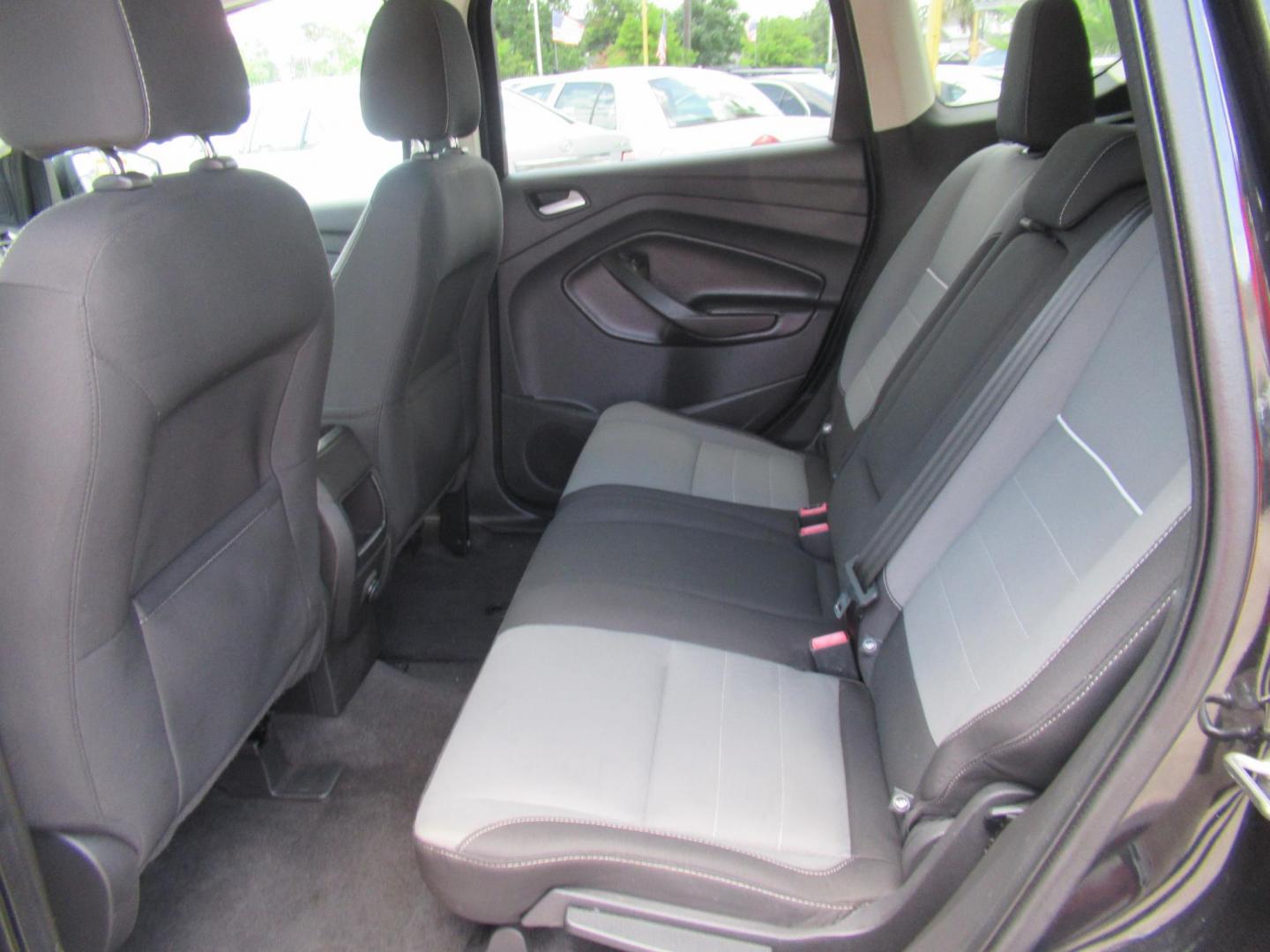 2014 Black /Black Ford Escape SE 4WD (1FMCU9GXXEU) with an 1.6L L4 DOHC 16V engine, Automatic transmission, located at 1511 North Shepherd Dr., Houston, TX, 77008, (281) 657-1221, 29.798361, -95.412560 - 2014 FORD ESCAPE SEVIN: 1FMCU9GXXEUC319764 DOOR WAGON-SPORT UTILITY1.6L I4 F DOHC 16VGASOLINEFRONT WHEEL DRIVE W- 4X4 - Photo#6