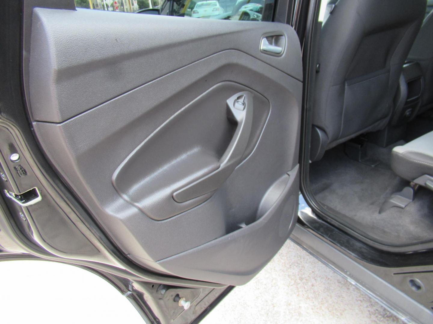 2014 Black /Black Ford Escape SE 4WD (1FMCU9GXXEU) with an 1.6L L4 DOHC 16V engine, Automatic transmission, located at 1511 North Shepherd Dr., Houston, TX, 77008, (281) 657-1221, 29.798361, -95.412560 - 2014 FORD ESCAPE SEVIN: 1FMCU9GXXEUC319764 DOOR WAGON-SPORT UTILITY1.6L I4 F DOHC 16VGASOLINEFRONT WHEEL DRIVE W- 4X4 - Photo#7