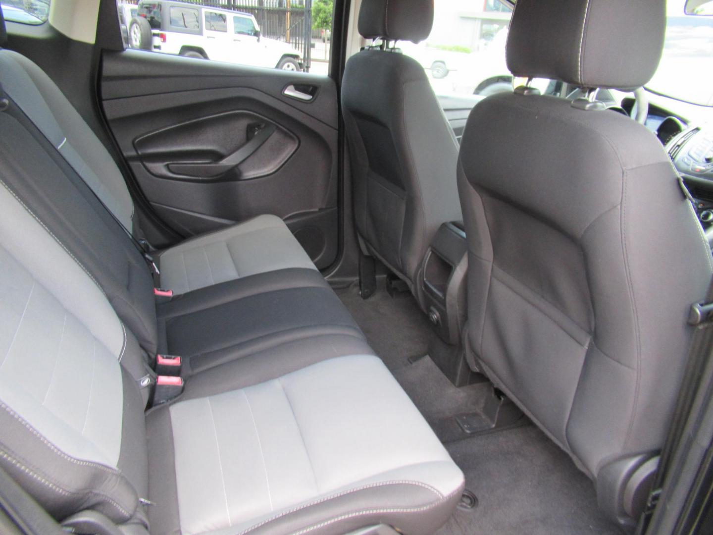 2014 Black /Black Ford Escape SE 4WD (1FMCU9GXXEU) with an 1.6L L4 DOHC 16V engine, Automatic transmission, located at 1511 North Shepherd Dr., Houston, TX, 77008, (281) 657-1221, 29.798361, -95.412560 - 2014 FORD ESCAPE SEVIN: 1FMCU9GXXEUC319764 DOOR WAGON-SPORT UTILITY1.6L I4 F DOHC 16VGASOLINEFRONT WHEEL DRIVE W- 4X4 - Photo#9