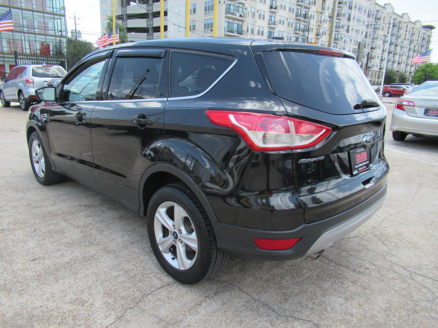 2014 Black /Black Ford Escape SE 4WD (1FMCU9GXXEU) with an 1.6L L4 DOHC 16V engine, Automatic transmission, located at 1511 North Shepherd Dr., Houston, TX, 77008, (281) 657-1221, 29.798361, -95.412560 - 2014 FORD ESCAPE SEVIN: 1FMCU9GXXEUC319764 DOOR WAGON-SPORT UTILITY1.6L I4 F DOHC 16VGASOLINEFRONT WHEEL DRIVE W- 4X4 - Photo#13