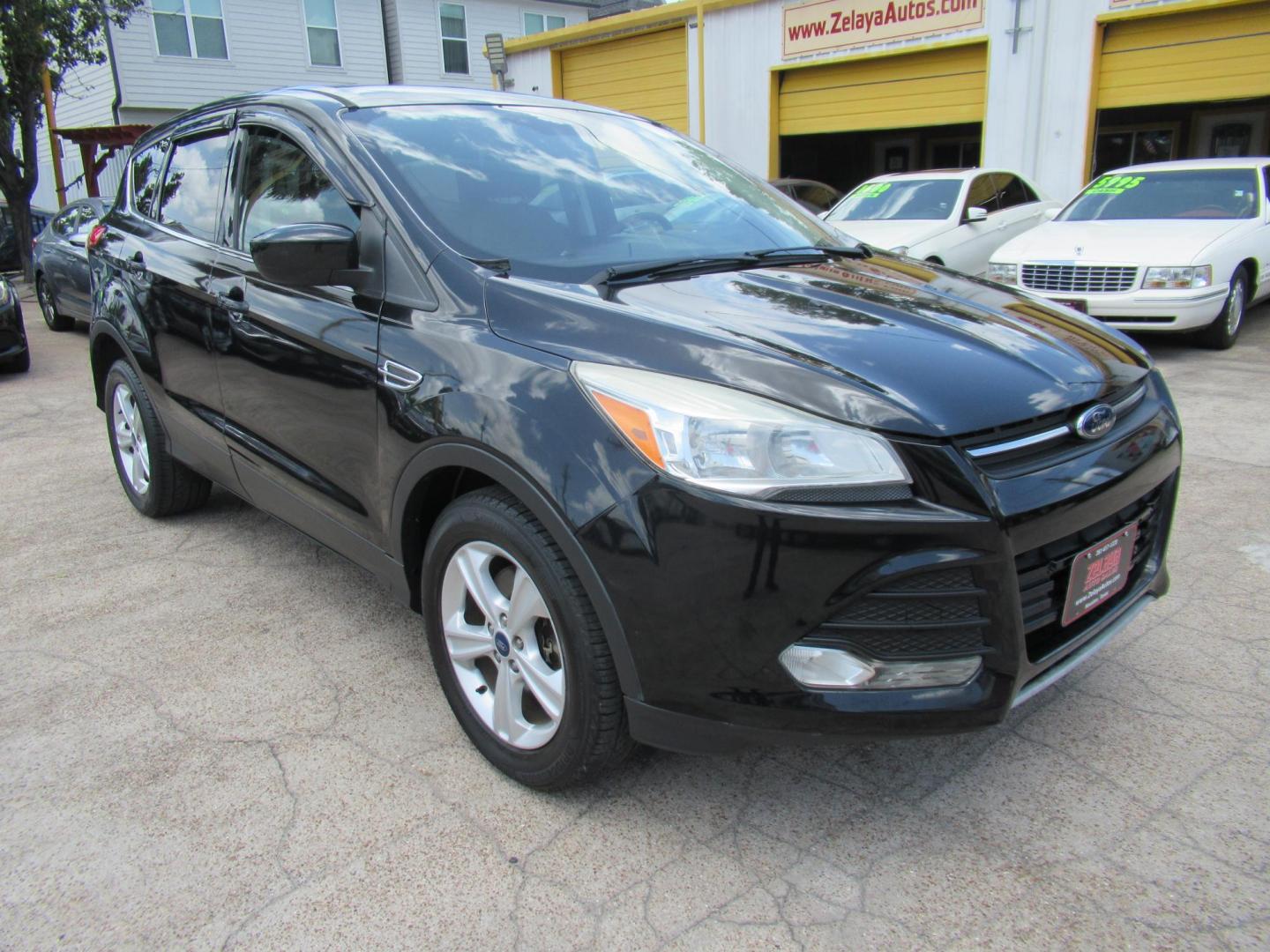 2014 Black /Black Ford Escape SE 4WD (1FMCU9GXXEU) with an 1.6L L4 DOHC 16V engine, Automatic transmission, located at 1511 North Shepherd Dr., Houston, TX, 77008, (281) 657-1221, 29.798361, -95.412560 - 2014 FORD ESCAPE SEVIN: 1FMCU9GXXEUC319764 DOOR WAGON-SPORT UTILITY1.6L I4 F DOHC 16VGASOLINEFRONT WHEEL DRIVE W- 4X4 - Photo#17