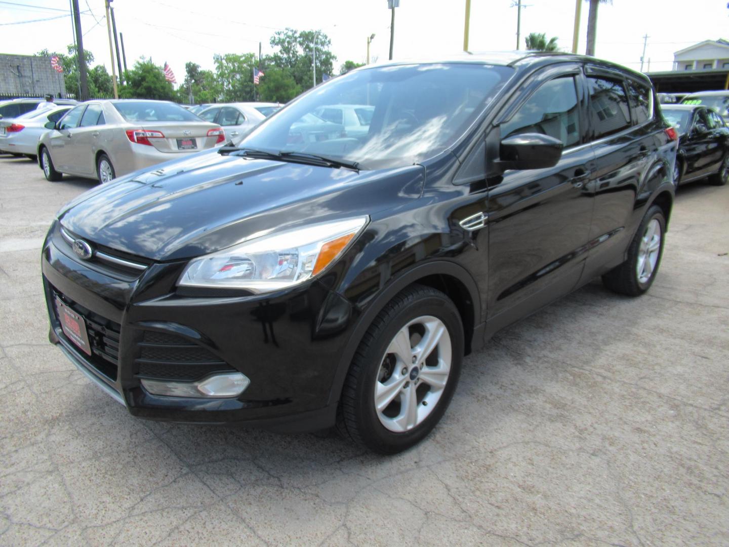 2014 Black /Black Ford Escape SE 4WD (1FMCU9GXXEU) with an 1.6L L4 DOHC 16V engine, Automatic transmission, located at 1511 North Shepherd Dr., Houston, TX, 77008, (281) 657-1221, 29.798361, -95.412560 - 2014 FORD ESCAPE SEVIN: 1FMCU9GXXEUC319764 DOOR WAGON-SPORT UTILITY1.6L I4 F DOHC 16VGASOLINEFRONT WHEEL DRIVE W- 4X4 - Photo#19