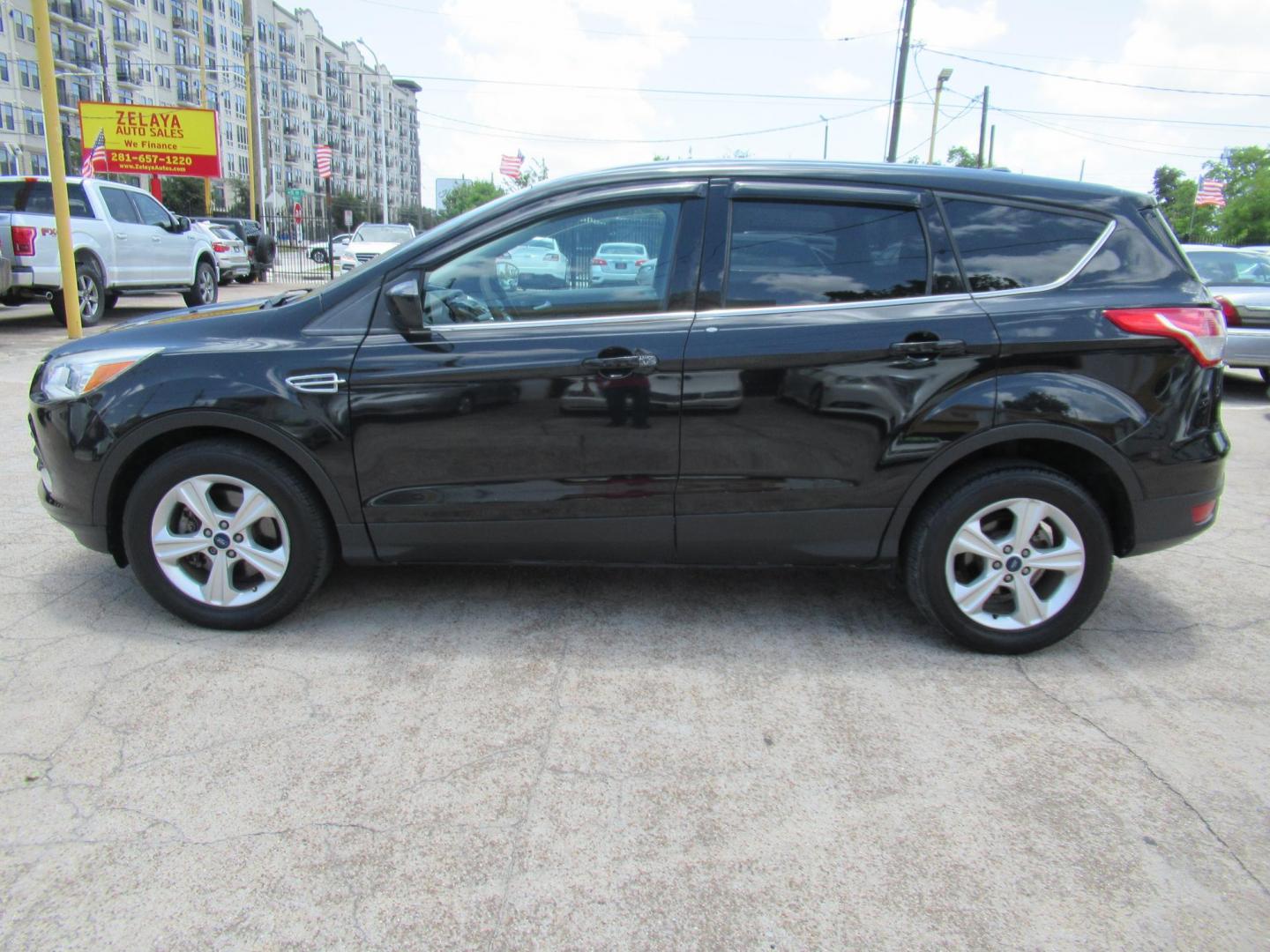 2014 Black /Black Ford Escape SE 4WD (1FMCU9GXXEU) with an 1.6L L4 DOHC 16V engine, Automatic transmission, located at 1511 North Shepherd Dr., Houston, TX, 77008, (281) 657-1221, 29.798361, -95.412560 - 2014 FORD ESCAPE SEVIN: 1FMCU9GXXEUC319764 DOOR WAGON-SPORT UTILITY1.6L I4 F DOHC 16VGASOLINEFRONT WHEEL DRIVE W- 4X4 - Photo#20