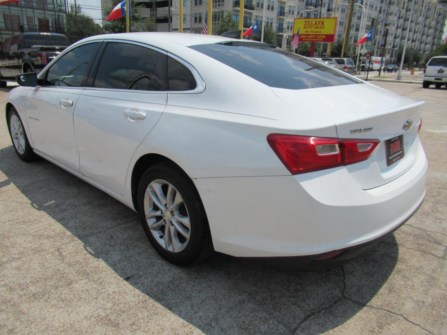 2016 White /Black Chevrolet Malibu 1FL (1G1ZC5ST4GF) with an 1.5L L4 DOHC 16V engine, Automatic transmission, located at 1511 North Shepherd Dr., Houston, TX, 77008, (281) 657-1221, 29.798361, -95.412560 - 2016 CHEVROLET MALIBU LSVIN: 1G1ZC5ST4GF226660SEDAN 4 DR1.5L I4 F DOHC 16VGASOLINEFRONT WHEEL DRIVE - Photo#13