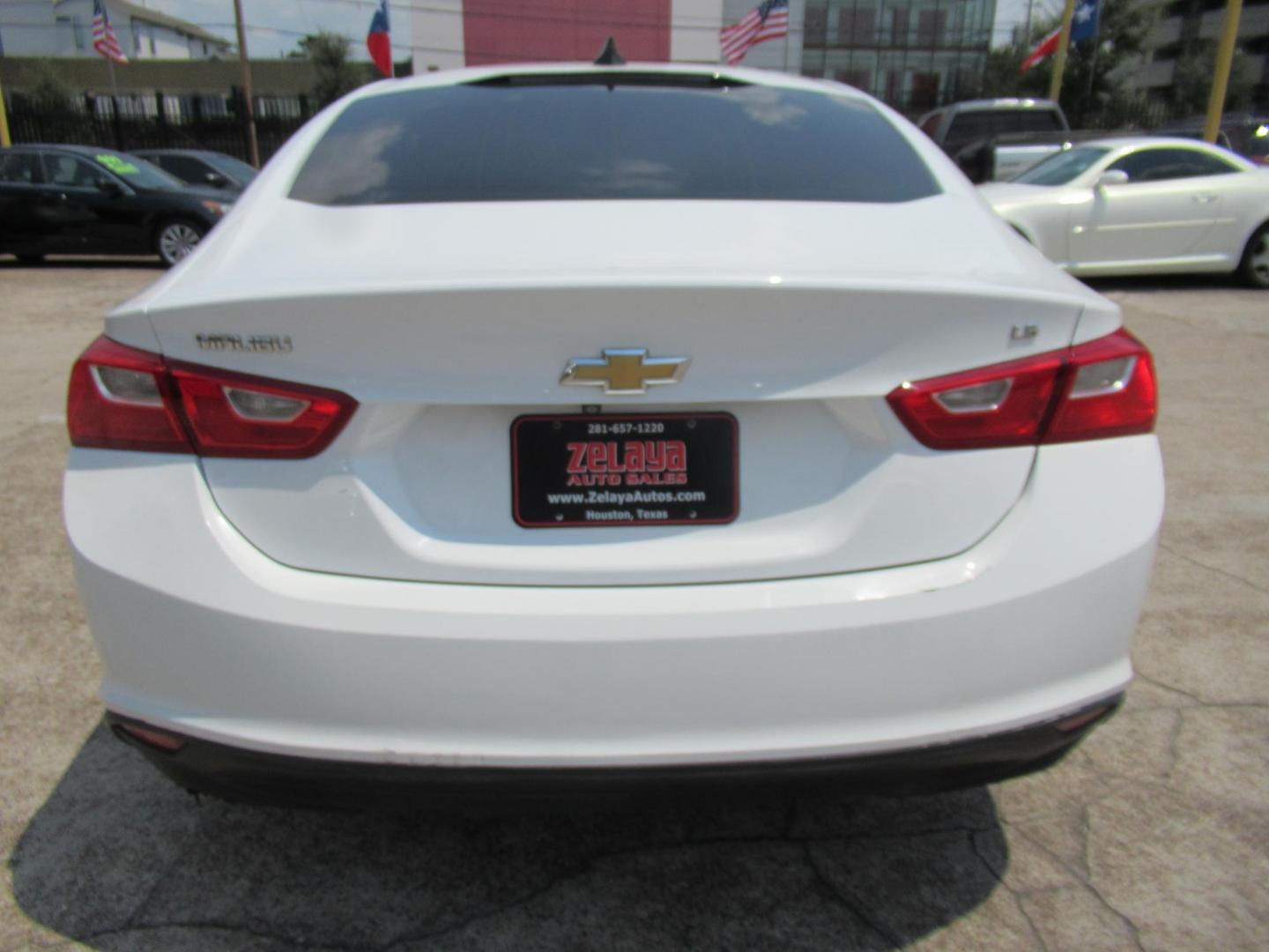 2016 White /Black Chevrolet Malibu 1FL (1G1ZC5ST4GF) with an 1.5L L4 DOHC 16V engine, Automatic transmission, located at 1511 North Shepherd Dr., Houston, TX, 77008, (281) 657-1221, 29.798361, -95.412560 - 2016 CHEVROLET MALIBU LSVIN: 1G1ZC5ST4GF226660SEDAN 4 DR1.5L I4 F DOHC 16VGASOLINEFRONT WHEEL DRIVE - Photo#14