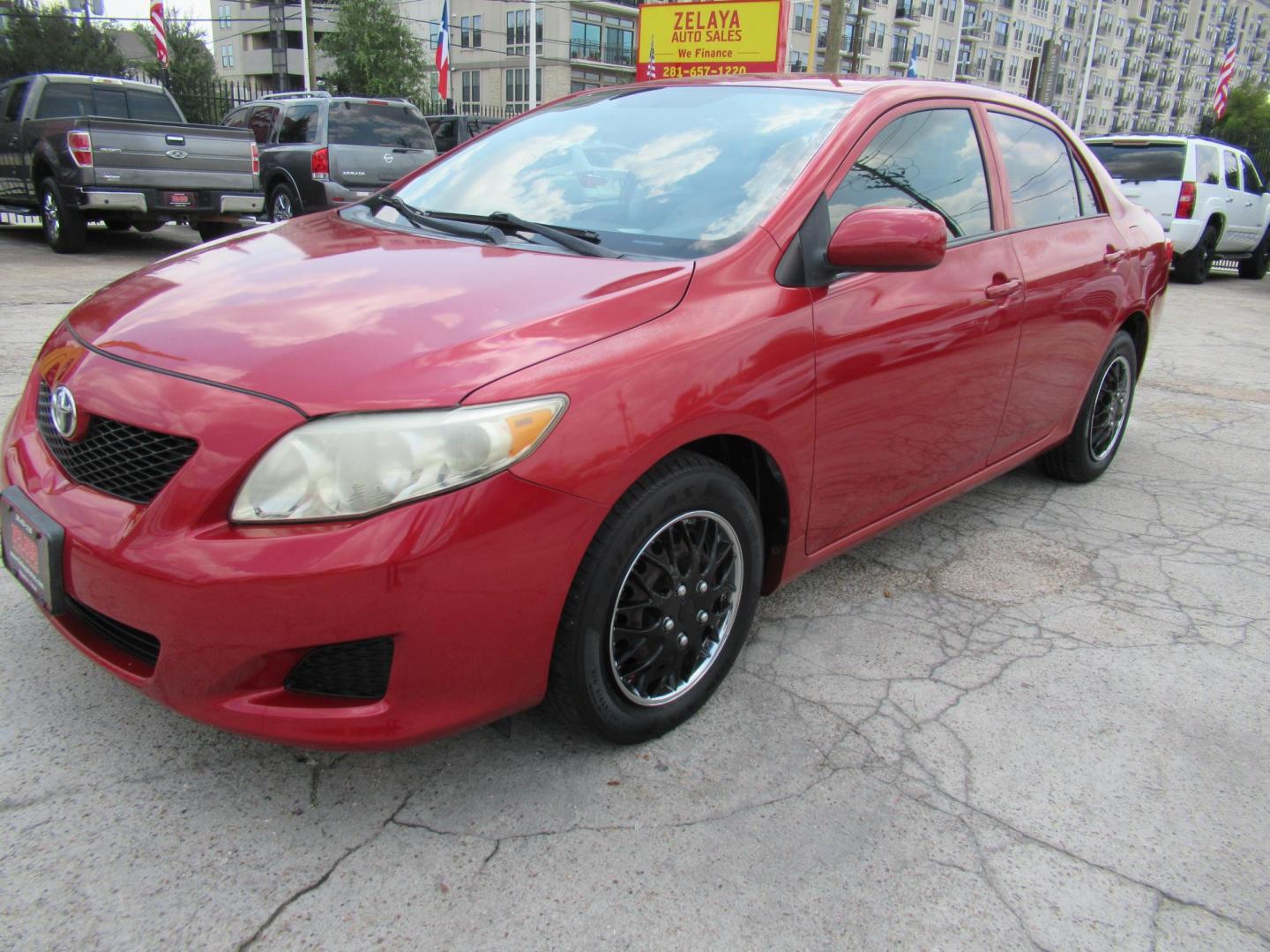 2009 Red /Tan Toyota Corolla Base 4-Speed AT (1NXBU40E09Z) with an 1.8L L4 DOHC 16V engine, Automatic Overdrive transmission, located at 1511 North Shepherd Dr., Houston, TX, 77008, (281) 657-1221, 29.798361, -95.412560 - 2009 TOYOTA COROLLA BASE-S-LE-XLEVIN: 1NXBU40E09Z063536SEDAN 4 DR1.8L I4 F DOHC 16VGASOLINEFRONT WHEEL DRIVE - Photo#0