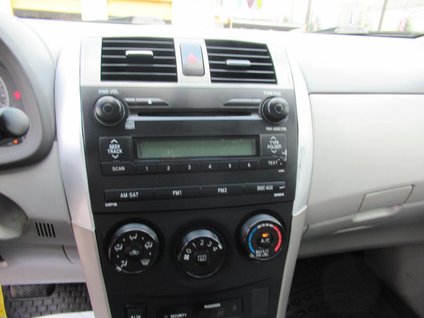 2009 Red /Tan Toyota Corolla Base 4-Speed AT (1NXBU40E09Z) with an 1.8L L4 DOHC 16V engine, Automatic Overdrive transmission, located at 1511 North Shepherd Dr., Houston, TX, 77008, (281) 657-1221, 29.798361, -95.412560 - 2009 TOYOTA COROLLA BASE-S-LE-XLEVIN: 1NXBU40E09Z063536SEDAN 4 DR1.8L I4 F DOHC 16VGASOLINEFRONT WHEEL DRIVE - Photo#2