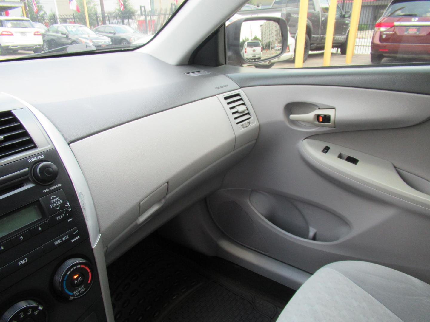 2009 Red /Tan Toyota Corolla Base AT (1NXBU40E09Z) with an 1.8L L4 DOHC 16V engine, Automatic Overdrive transmission, located at 1511 North Shepherd Dr., Houston, TX, 77008, (281) 657-1221, 29.798361, -95.412560 - 2009 TOYOTA COROLLA BASE-S-LE-XLEVIN: 1NXBU40E09Z063536SEDAN 4 DR1.8L I4 F DOHC 16VGASOLINEFRONT WHEEL DRIVE - Photo#3