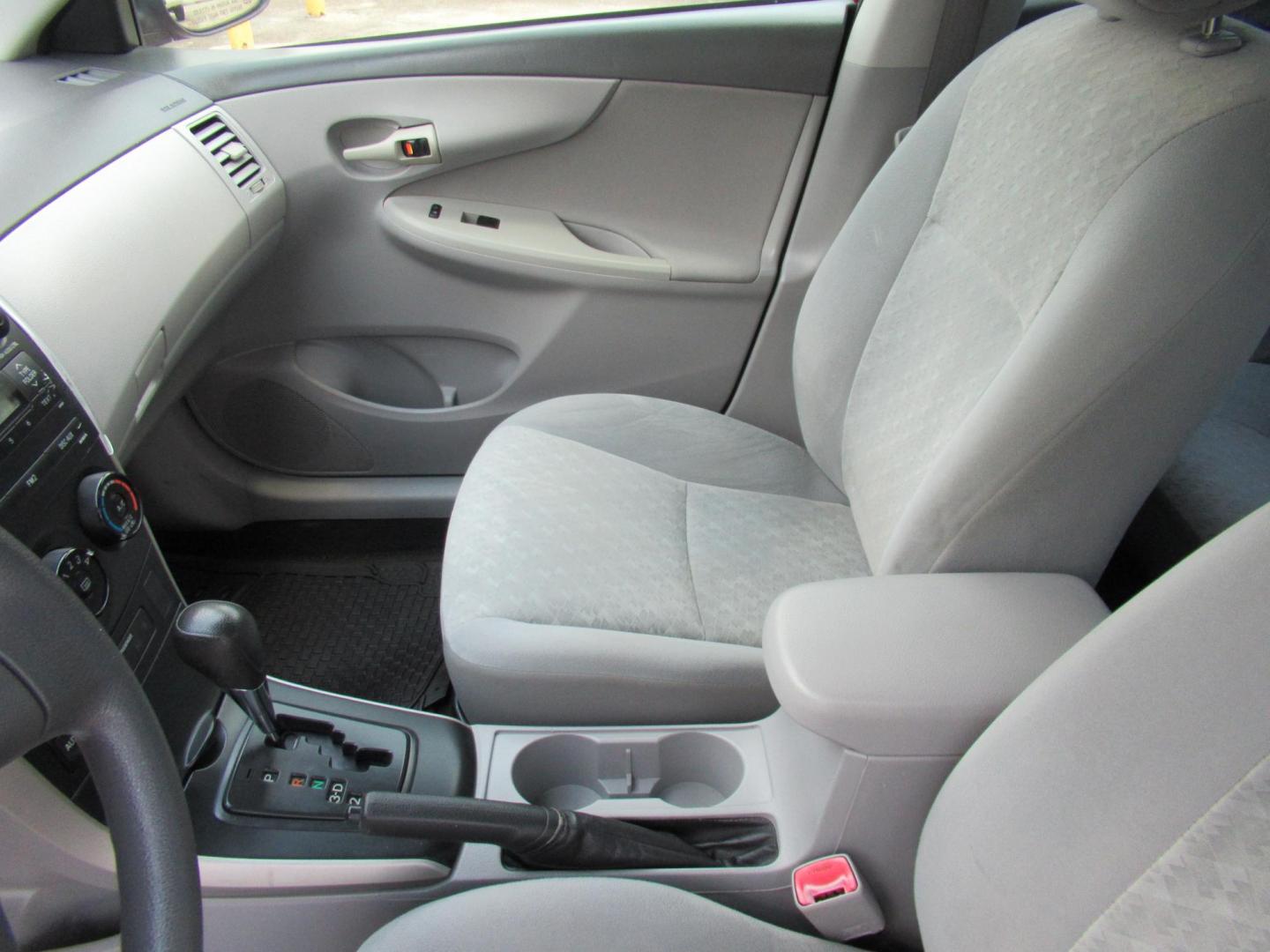 2009 Red /Tan Toyota Corolla Base 4-Speed AT (1NXBU40E09Z) with an 1.8L L4 DOHC 16V engine, Automatic Overdrive transmission, located at 1511 North Shepherd Dr., Houston, TX, 77008, (281) 657-1221, 29.798361, -95.412560 - 2009 TOYOTA COROLLA BASE-S-LE-XLEVIN: 1NXBU40E09Z063536SEDAN 4 DR1.8L I4 F DOHC 16VGASOLINEFRONT WHEEL DRIVE - Photo#4