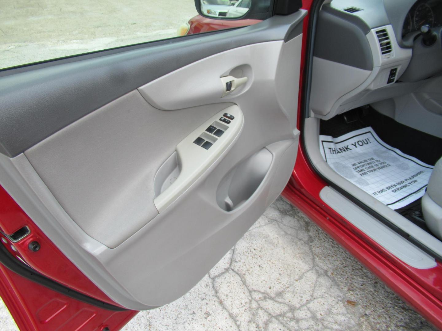2009 Red /Tan Toyota Corolla Base 4-Speed AT (1NXBU40E09Z) with an 1.8L L4 DOHC 16V engine, Automatic Overdrive transmission, located at 1511 North Shepherd Dr., Houston, TX, 77008, (281) 657-1221, 29.798361, -95.412560 - 2009 TOYOTA COROLLA BASE-S-LE-XLEVIN: 1NXBU40E09Z063536SEDAN 4 DR1.8L I4 F DOHC 16VGASOLINEFRONT WHEEL DRIVE - Photo#6