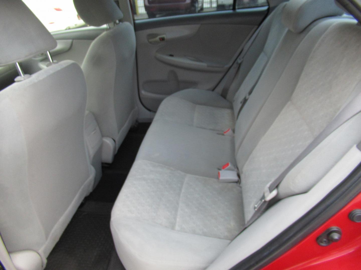 2009 Red /Tan Toyota Corolla Base 4-Speed AT (1NXBU40E09Z) with an 1.8L L4 DOHC 16V engine, Automatic Overdrive transmission, located at 1511 North Shepherd Dr., Houston, TX, 77008, (281) 657-1221, 29.798361, -95.412560 - 2009 TOYOTA COROLLA BASE-S-LE-XLEVIN: 1NXBU40E09Z063536SEDAN 4 DR1.8L I4 F DOHC 16VGASOLINEFRONT WHEEL DRIVE - Photo#7
