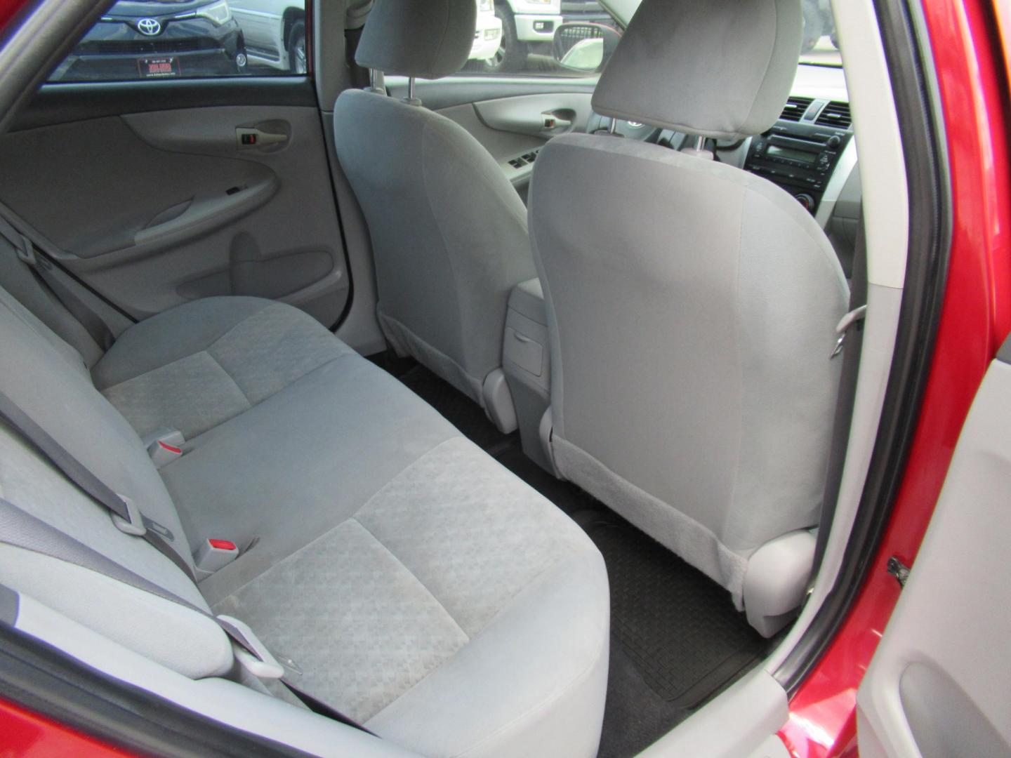 2009 Red /Tan Toyota Corolla Base 4-Speed AT (1NXBU40E09Z) with an 1.8L L4 DOHC 16V engine, Automatic Overdrive transmission, located at 1511 North Shepherd Dr., Houston, TX, 77008, (281) 657-1221, 29.798361, -95.412560 - 2009 TOYOTA COROLLA BASE-S-LE-XLEVIN: 1NXBU40E09Z063536SEDAN 4 DR1.8L I4 F DOHC 16VGASOLINEFRONT WHEEL DRIVE - Photo#9