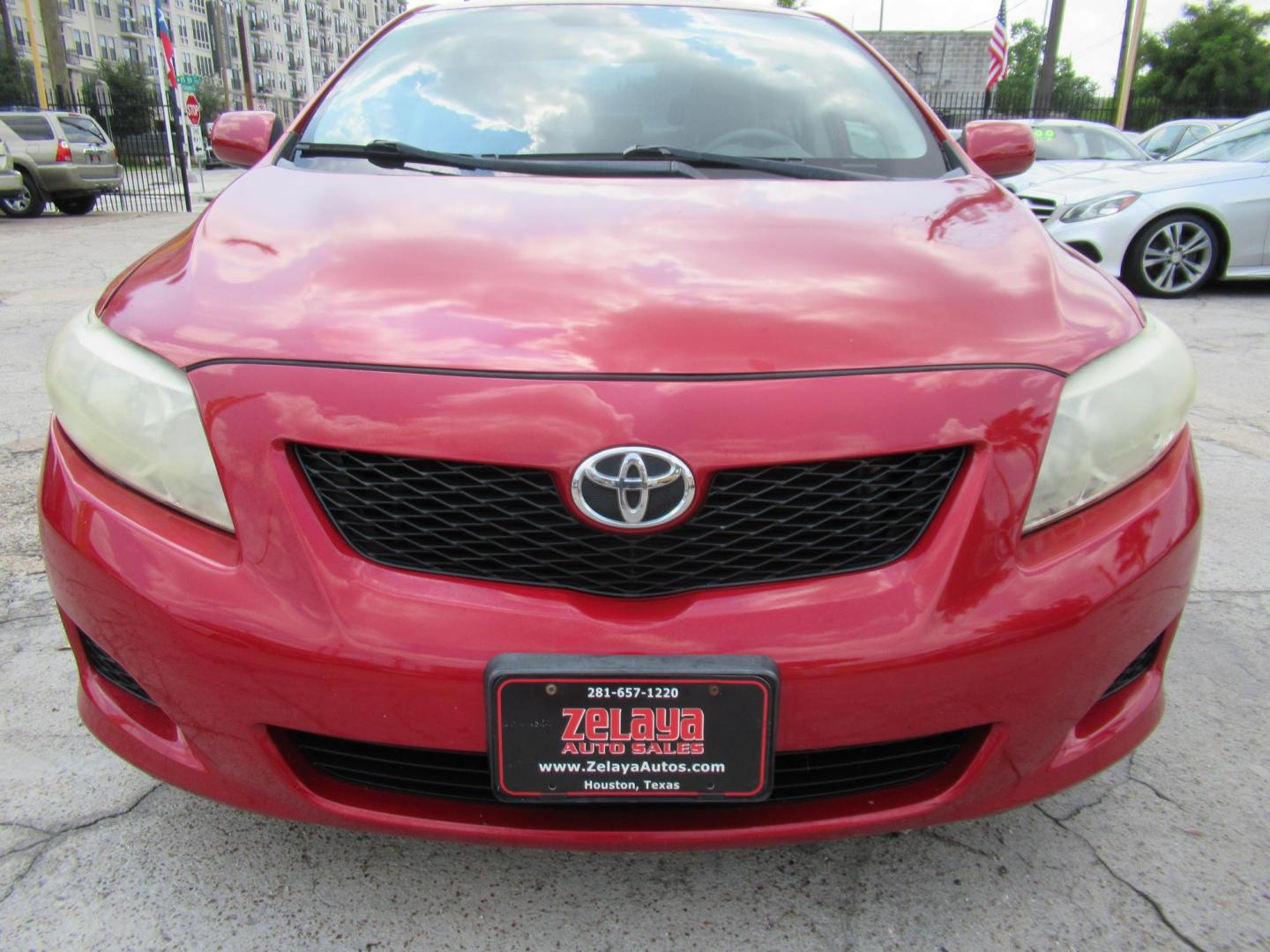 2009 Red /Tan Toyota Corolla Base 4-Speed AT (1NXBU40E09Z) with an 1.8L L4 DOHC 16V engine, Automatic Overdrive transmission, located at 1511 North Shepherd Dr., Houston, TX, 77008, (281) 657-1221, 29.798361, -95.412560 - 2009 TOYOTA COROLLA BASE-S-LE-XLEVIN: 1NXBU40E09Z063536SEDAN 4 DR1.8L I4 F DOHC 16VGASOLINEFRONT WHEEL DRIVE - Photo#11
