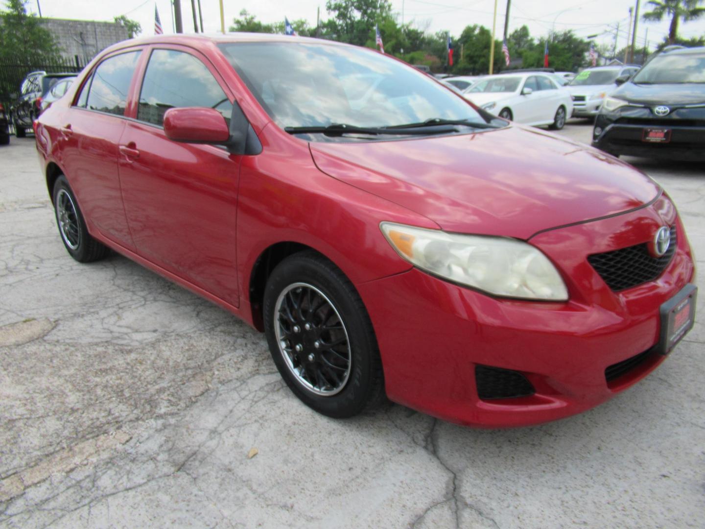 2009 Red /Tan Toyota Corolla Base 4-Speed AT (1NXBU40E09Z) with an 1.8L L4 DOHC 16V engine, Automatic Overdrive transmission, located at 1511 North Shepherd Dr., Houston, TX, 77008, (281) 657-1221, 29.798361, -95.412560 - 2009 TOYOTA COROLLA BASE-S-LE-XLEVIN: 1NXBU40E09Z063536SEDAN 4 DR1.8L I4 F DOHC 16VGASOLINEFRONT WHEEL DRIVE - Photo#10