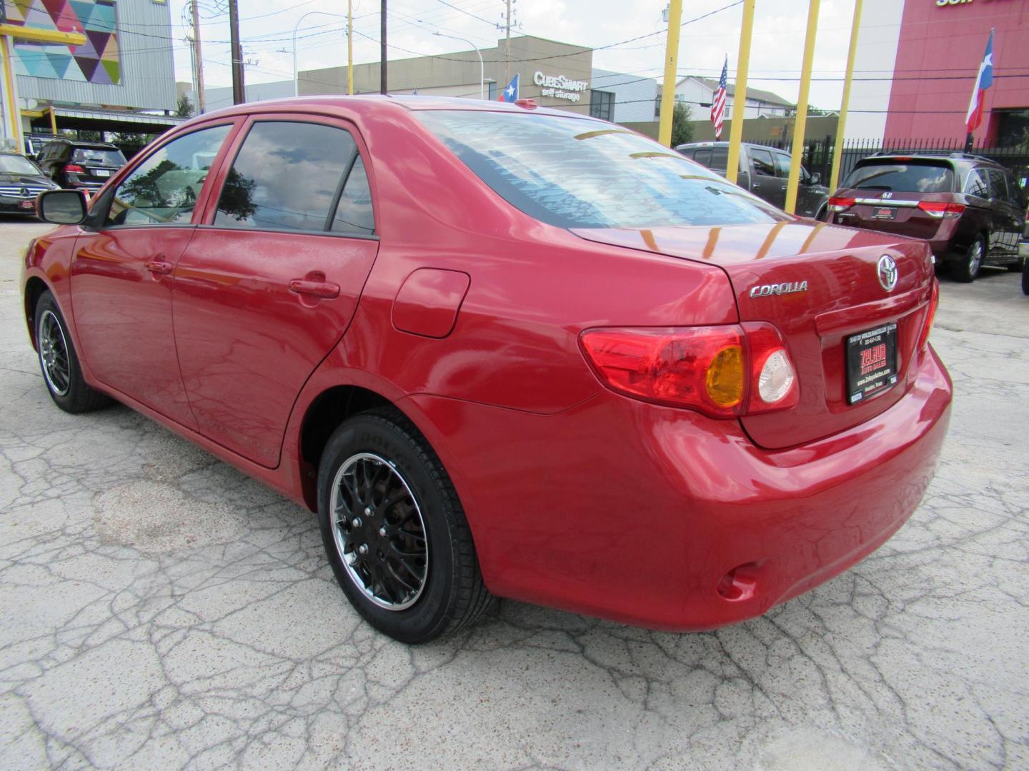 2009 Red /Tan Toyota Corolla Base AT (1NXBU40E09Z) with an 1.8L L4 DOHC 16V engine, Automatic Overdrive transmission, located at 1511 North Shepherd Dr., Houston, TX, 77008, (281) 657-1221, 29.798361, -95.412560 - 2009 TOYOTA COROLLA BASE-S-LE-XLEVIN: 1NXBU40E09Z063536SEDAN 4 DR1.8L I4 F DOHC 16VGASOLINEFRONT WHEEL DRIVE - Photo#14