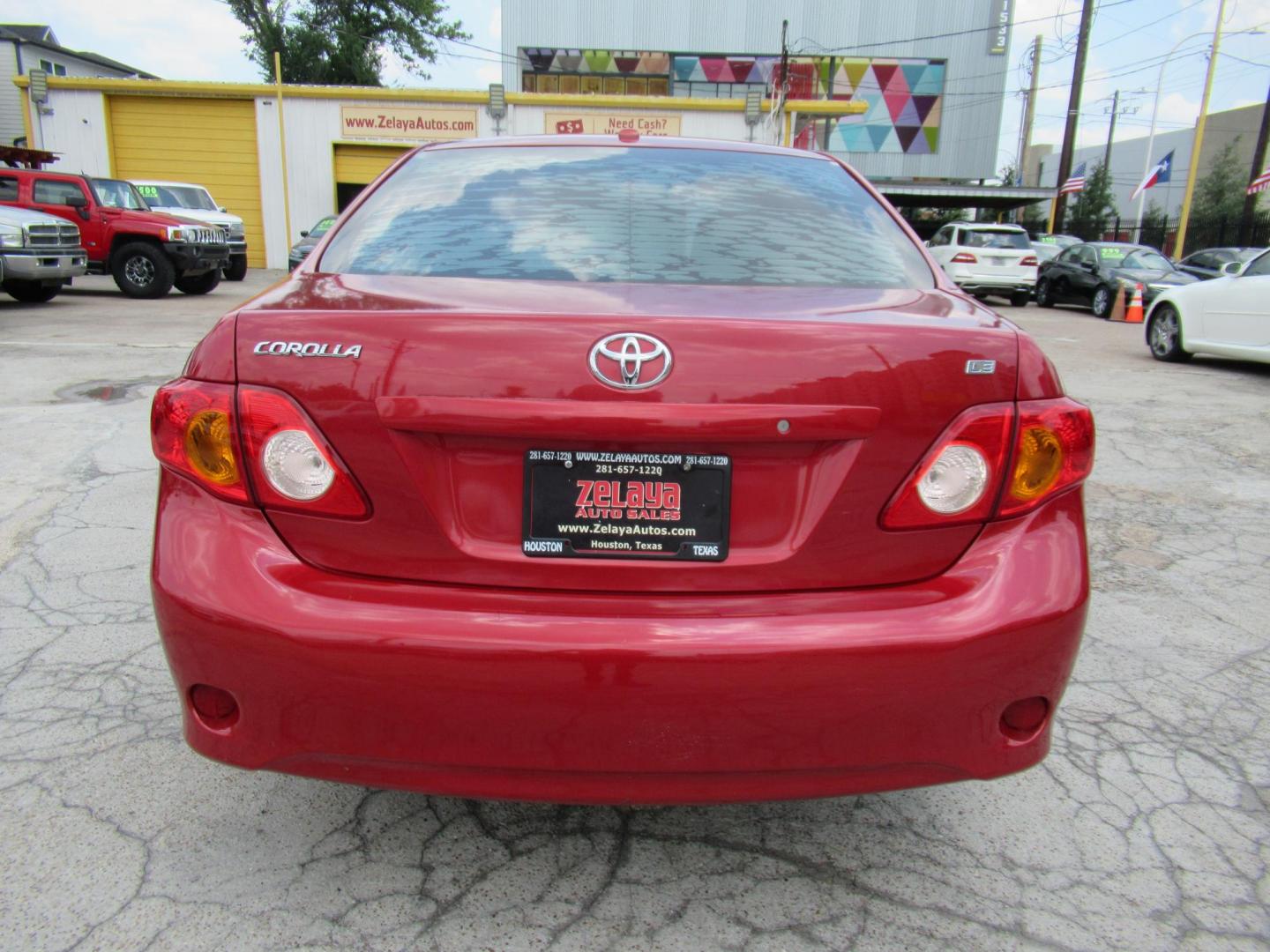 2009 Red /Tan Toyota Corolla Base 4-Speed AT (1NXBU40E09Z) with an 1.8L L4 DOHC 16V engine, Automatic Overdrive transmission, located at 1511 North Shepherd Dr., Houston, TX, 77008, (281) 657-1221, 29.798361, -95.412560 - 2009 TOYOTA COROLLA BASE-S-LE-XLEVIN: 1NXBU40E09Z063536SEDAN 4 DR1.8L I4 F DOHC 16VGASOLINEFRONT WHEEL DRIVE - Photo#15
