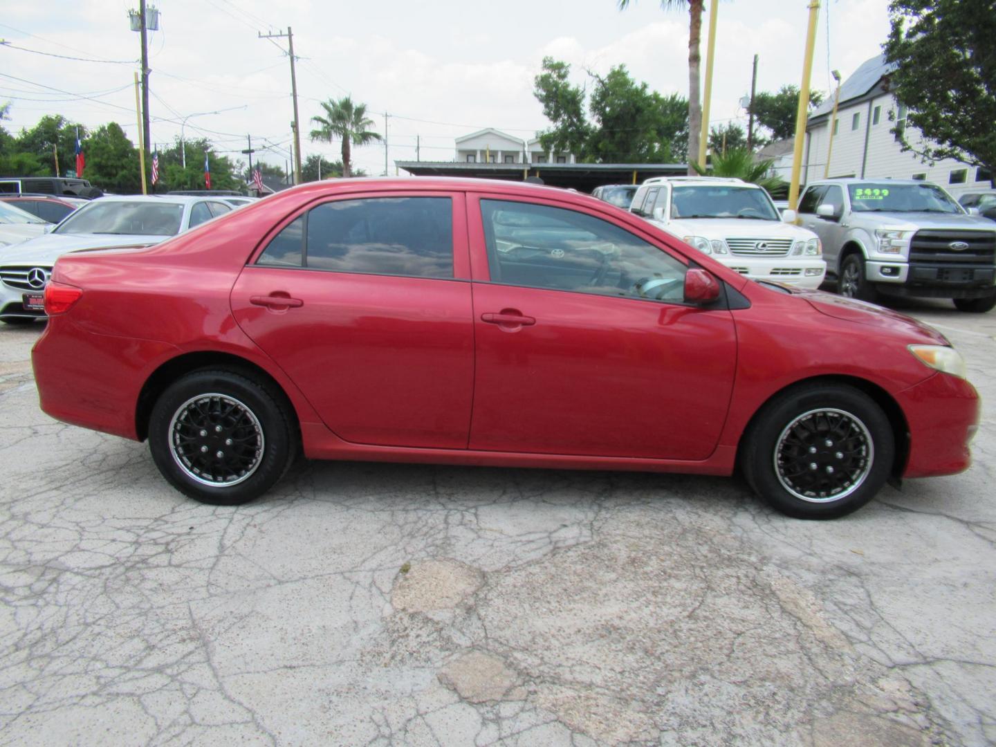2009 Red /Tan Toyota Corolla Base AT (1NXBU40E09Z) with an 1.8L L4 DOHC 16V engine, Automatic Overdrive transmission, located at 1511 North Shepherd Dr., Houston, TX, 77008, (281) 657-1221, 29.798361, -95.412560 - 2009 TOYOTA COROLLA BASE-S-LE-XLEVIN: 1NXBU40E09Z063536SEDAN 4 DR1.8L I4 F DOHC 16VGASOLINEFRONT WHEEL DRIVE - Photo#17