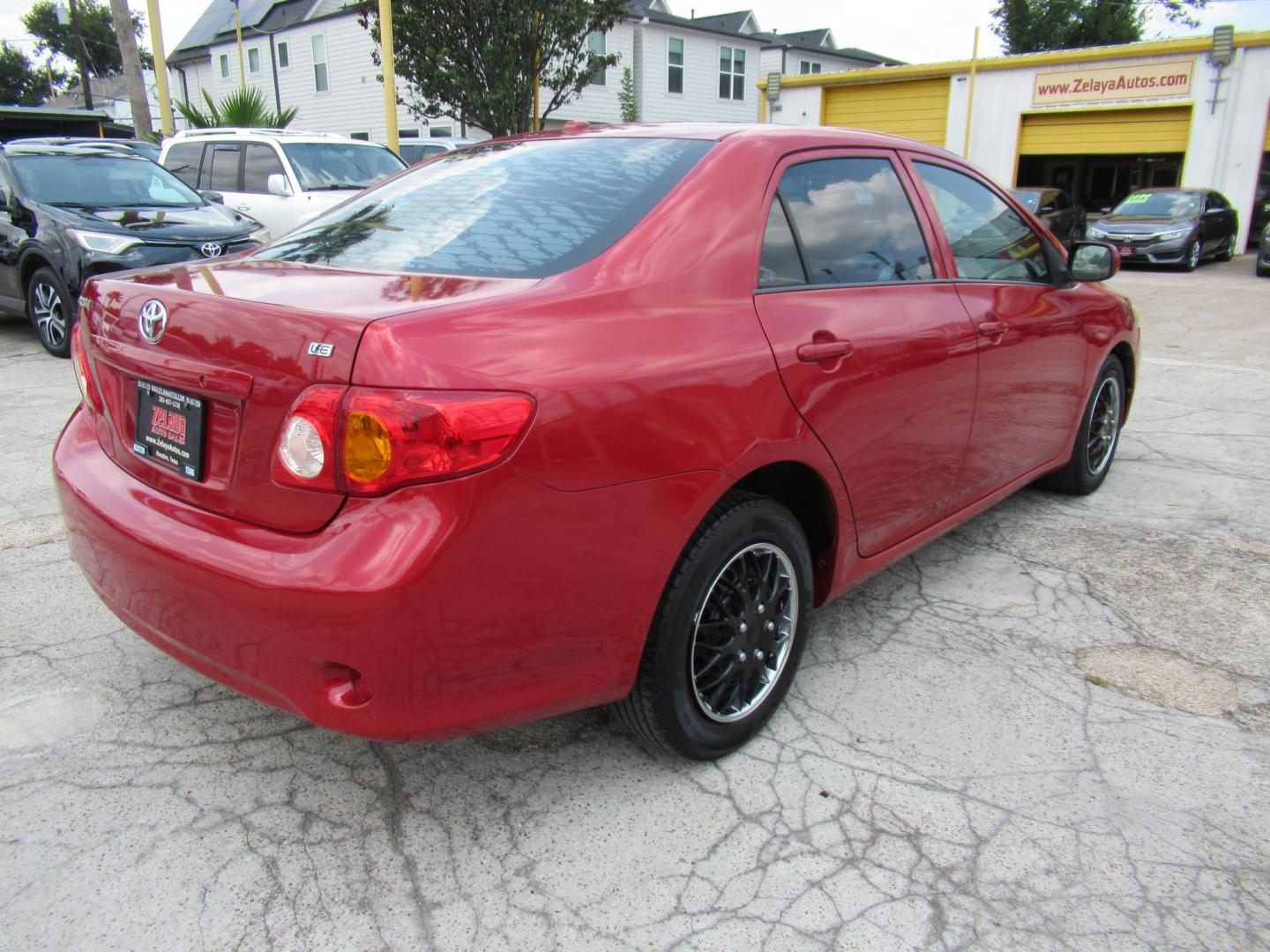 2009 Red /Tan Toyota Corolla Base AT (1NXBU40E09Z) with an 1.8L L4 DOHC 16V engine, Automatic Overdrive transmission, located at 1511 North Shepherd Dr., Houston, TX, 77008, (281) 657-1221, 29.798361, -95.412560 - 2009 TOYOTA COROLLA BASE-S-LE-XLEVIN: 1NXBU40E09Z063536SEDAN 4 DR1.8L I4 F DOHC 16VGASOLINEFRONT WHEEL DRIVE - Photo#16