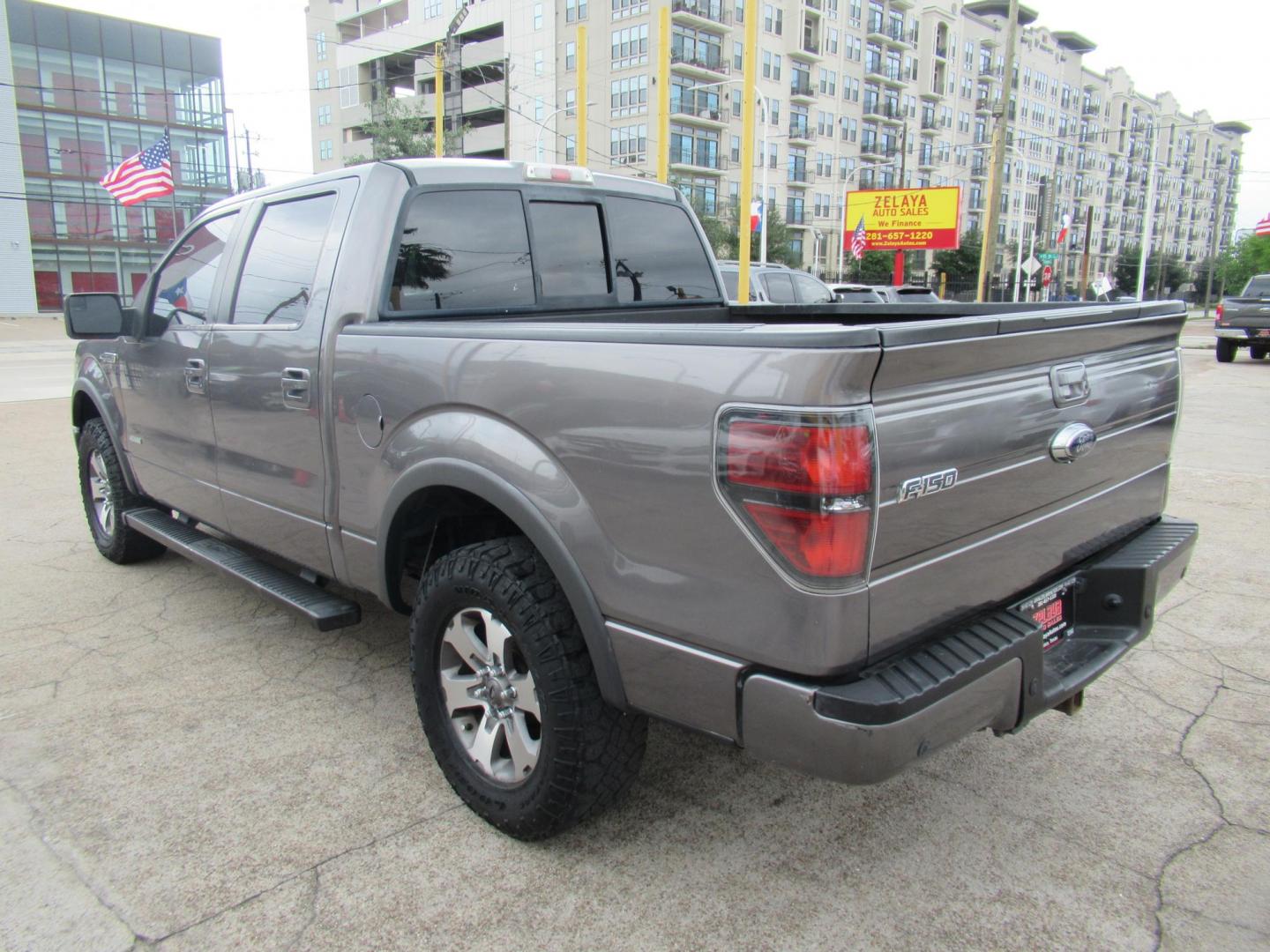 2014 Gray /Black Ford F-150 FX4 SuperCrew 5.5-ft. Bed 4WD (1FTFW1ETXEF) with an 3.5L V6 TURBO engine, Automatic transmission, located at 1511 North Shepherd Dr., Houston, TX, 77008, (281) 657-1221, 29.798361, -95.412560 - 2014 FORD F150 SUPERCREW VIN: 1FTFW1ETXEFB42913 CREW PICKUP 3.5L V6 F DOHC 24V GASOLINE REAR WHEEL DRIVE W/ 4X4 Original Window Sticker - Photo#17