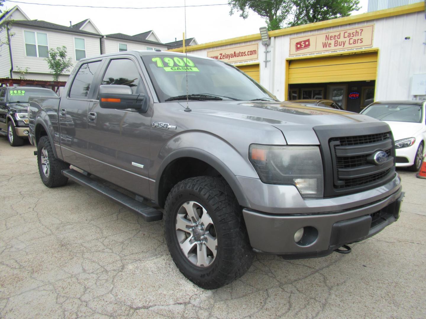 2014 Gray /Black Ford F-150 FX4 SuperCrew 5.5-ft. Bed 4WD (1FTFW1ETXEF) with an 3.5L V6 TURBO engine, Automatic transmission, located at 1511 North Shepherd Dr., Houston, TX, 77008, (281) 657-1221, 29.798361, -95.412560 - 2014 FORD F150 SUPERCREW VIN: 1FTFW1ETXEFB42913 CREW PICKUP 3.5L V6 F DOHC 24V GASOLINE REAR WHEEL DRIVE W/ 4X4- Photo#21
