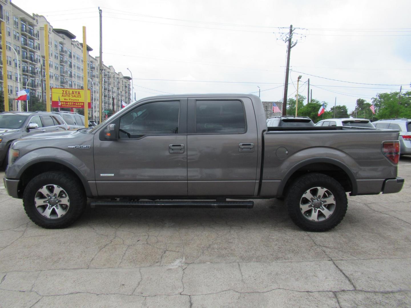 2014 Gray /Black Ford F-150 FX4 SuperCrew 5.5-ft. Bed 4WD (1FTFW1ETXEF) with an 3.5L V6 TURBO engine, Automatic transmission, located at 1511 North Shepherd Dr., Houston, TX, 77008, (281) 657-1221, 29.798361, -95.412560 - 2014 FORD F150 SUPERCREW VIN: 1FTFW1ETXEFB42913 CREW PICKUP 3.5L V6 F DOHC 24V GASOLINE REAR WHEEL DRIVE W/ 4X4- Photo#24
