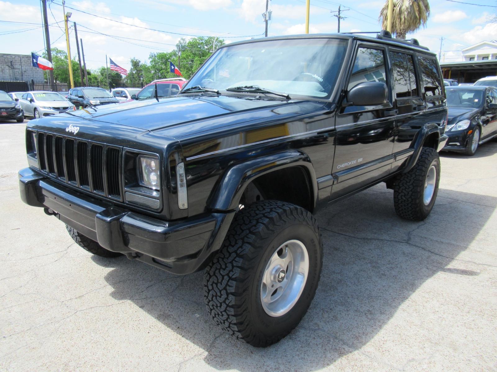 1999 Black /Black Jeep Cherokee Limited 4WD (1J4FF78SXXL) with an 4.0L L6 OHV 12V engine, Automatic Overdrive transmission, located at 1511 North Shepherd Dr., Houston, TX, 77008, (281) 657-1221, 29.798361, -95.412560 - 1999 JEEP CHEROKEE LIMITED VIN: 1J4FF78SXXL517591 1 J 4 F F 7 8 S X X L 5 1 7 5 9 1 4 DOOR WAGON/SPORT UTILITY 4.0L I6 F GASOLINE REAR WHEEL DRIVE W/ 4X4 - Photo #35