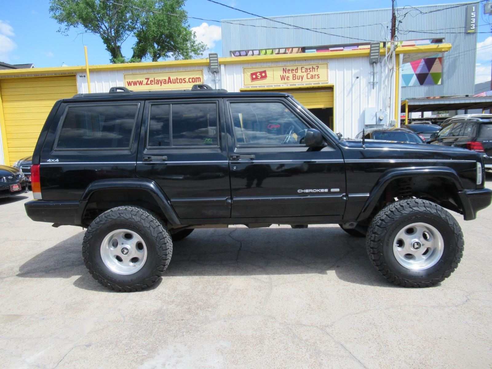 1999 Black /Black Jeep Cherokee Limited 4WD (1J4FF78SXXL) with an 4.0L L6 OHV 12V engine, Automatic Overdrive transmission, located at 1511 North Shepherd Dr., Houston, TX, 77008, (281) 657-1221, 29.798361, -95.412560 - 1999 JEEP CHEROKEE LIMITED VIN: 1J4FF78SXXL517591 1 J 4 F F 7 8 S X X L 5 1 7 5 9 1 4 DOOR WAGON/SPORT UTILITY 4.0L I6 F GASOLINE REAR WHEEL DRIVE W/ 4X4 - Photo #38
