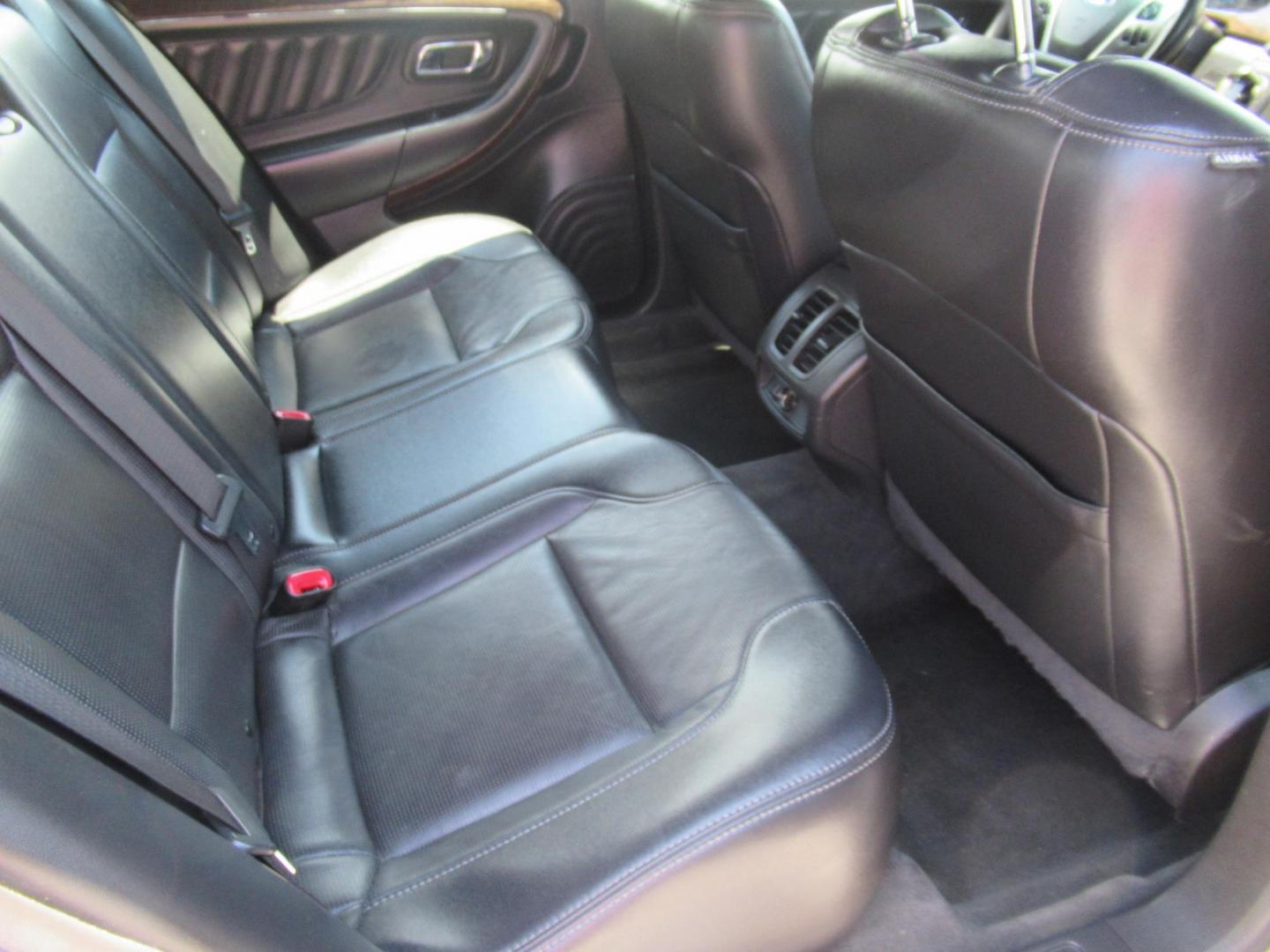 2013 Silver /Black Ford Taurus Limited FWD (1FAHP2F89DG) with an 3.5L V6 DOHC 24V engine, Automatic transmission, located at 1511 North Shepherd Dr., Houston, TX, 77008, (281) 657-1221, 29.798361, -95.412560 - 2013 FORD TAURUS LIMITED VIN: 1FAHP2F89DG103802 1 F A H P 2 F 8 9 D G 1 0 3 8 0 2 SEDAN 4 DR 3.5L V6 F DOHC 24V GASOLINE FRONT WHEEL DRIVE - Photo#9