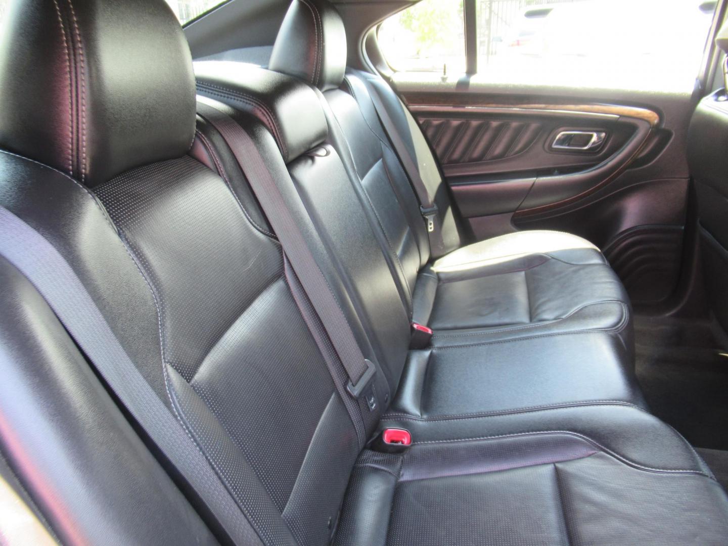 2013 Silver /Black Ford Taurus Limited FWD (1FAHP2F89DG) with an 3.5L V6 DOHC 24V engine, Automatic transmission, located at 1511 North Shepherd Dr., Houston, TX, 77008, (281) 657-1221, 29.798361, -95.412560 - 2013 FORD TAURUS LIMITED VIN: 1FAHP2F89DG103802 1 F A H P 2 F 8 9 D G 1 0 3 8 0 2 SEDAN 4 DR 3.5L V6 F DOHC 24V GASOLINE FRONT WHEEL DRIVE - Photo#10