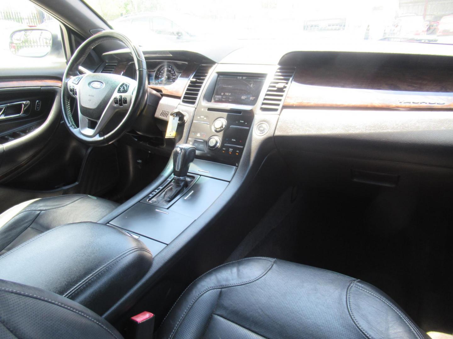 2013 Silver /Black Ford Taurus Limited FWD (1FAHP2F89DG) with an 3.5L V6 DOHC 24V engine, Automatic transmission, located at 1511 North Shepherd Dr., Houston, TX, 77008, (281) 657-1221, 29.798361, -95.412560 - 2013 FORD TAURUS LIMITED VIN: 1FAHP2F89DG103802 1 F A H P 2 F 8 9 D G 1 0 3 8 0 2 SEDAN 4 DR 3.5L V6 F DOHC 24V GASOLINE FRONT WHEEL DRIVE - Photo#11