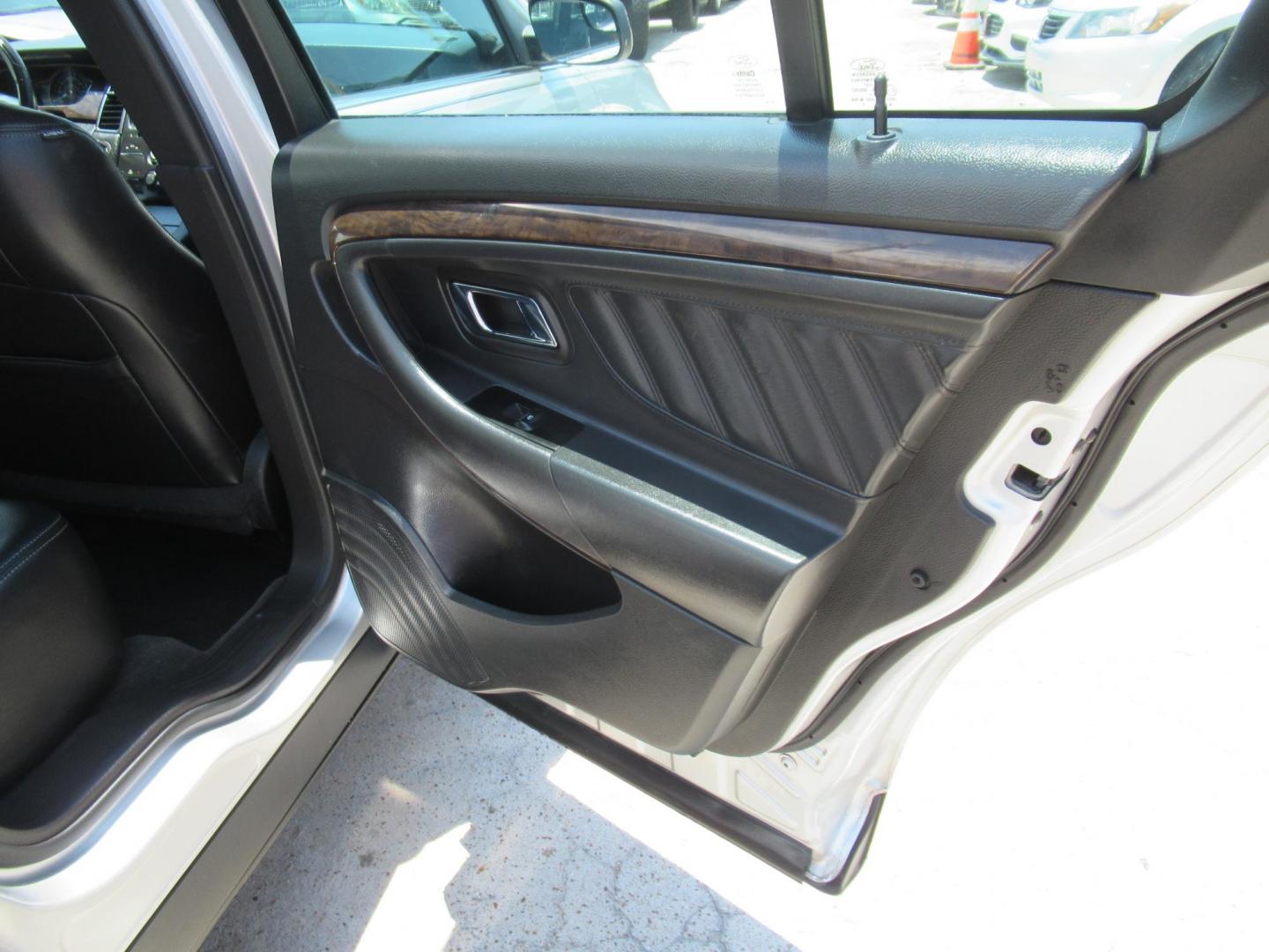 2013 Silver /Black Ford Taurus Limited FWD (1FAHP2F89DG) with an 3.5L V6 DOHC 24V engine, Automatic transmission, located at 1511 North Shepherd Dr., Houston, TX, 77008, (281) 657-1221, 29.798361, -95.412560 - 2013 FORD TAURUS LIMITED VIN: 1FAHP2F89DG103802 1 F A H P 2 F 8 9 D G 1 0 3 8 0 2 SEDAN 4 DR 3.5L V6 F DOHC 24V GASOLINE FRONT WHEEL DRIVE - Photo#12