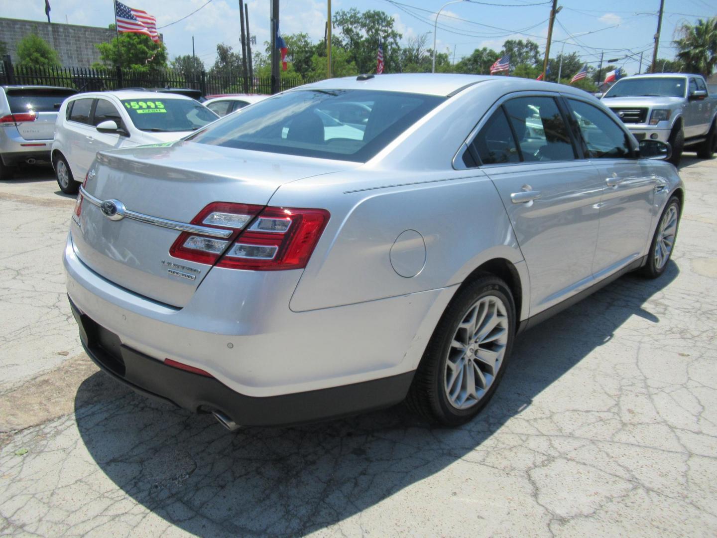 2013 Silver /Black Ford Taurus Limited FWD (1FAHP2F89DG) with an 3.5L V6 DOHC 24V engine, Automatic transmission, located at 1511 North Shepherd Dr., Houston, TX, 77008, (281) 657-1221, 29.798361, -95.412560 - 2013 FORD TAURUS LIMITED VIN: 1FAHP2F89DG103802 1 F A H P 2 F 8 9 D G 1 0 3 8 0 2 SEDAN 4 DR 3.5L V6 F DOHC 24V GASOLINE FRONT WHEEL DRIVE - Photo#16