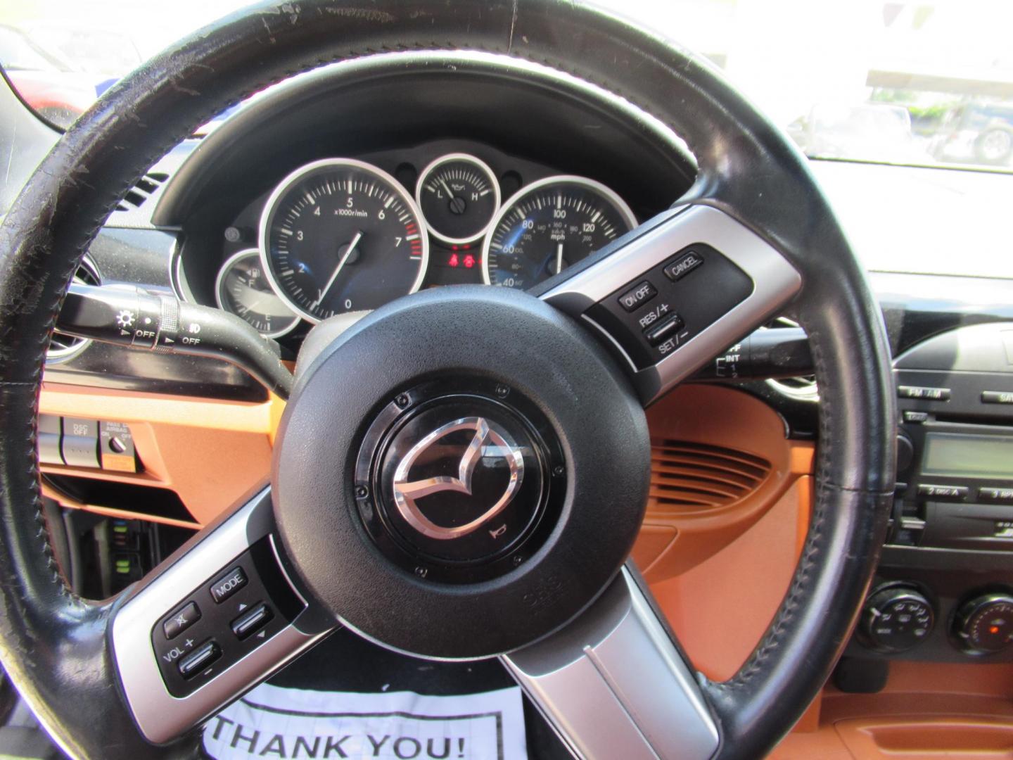 2006 /Brown Mazda MX-5 Miata 3rd Generation Limited (JM1NC25F760) with an 2.0L L4 DOHC 16V engine, 6-Speed Manual Overdrive transmission, located at 1511 North Shepherd Dr., Houston, TX, 77008, (281) 657-1221, 29.798361, -95.412560 - 2006 MAZDA MX-5 MIATA SPORT VIN: JM1NC25F760105827 J M 1 N C 2 5 F 7 6 0 1 0 5 8 2 7 CONVERTIBLE 2.0L I4 F DOHC 16V GASOLINE REAR WHEEL DRIVE - Photo#3