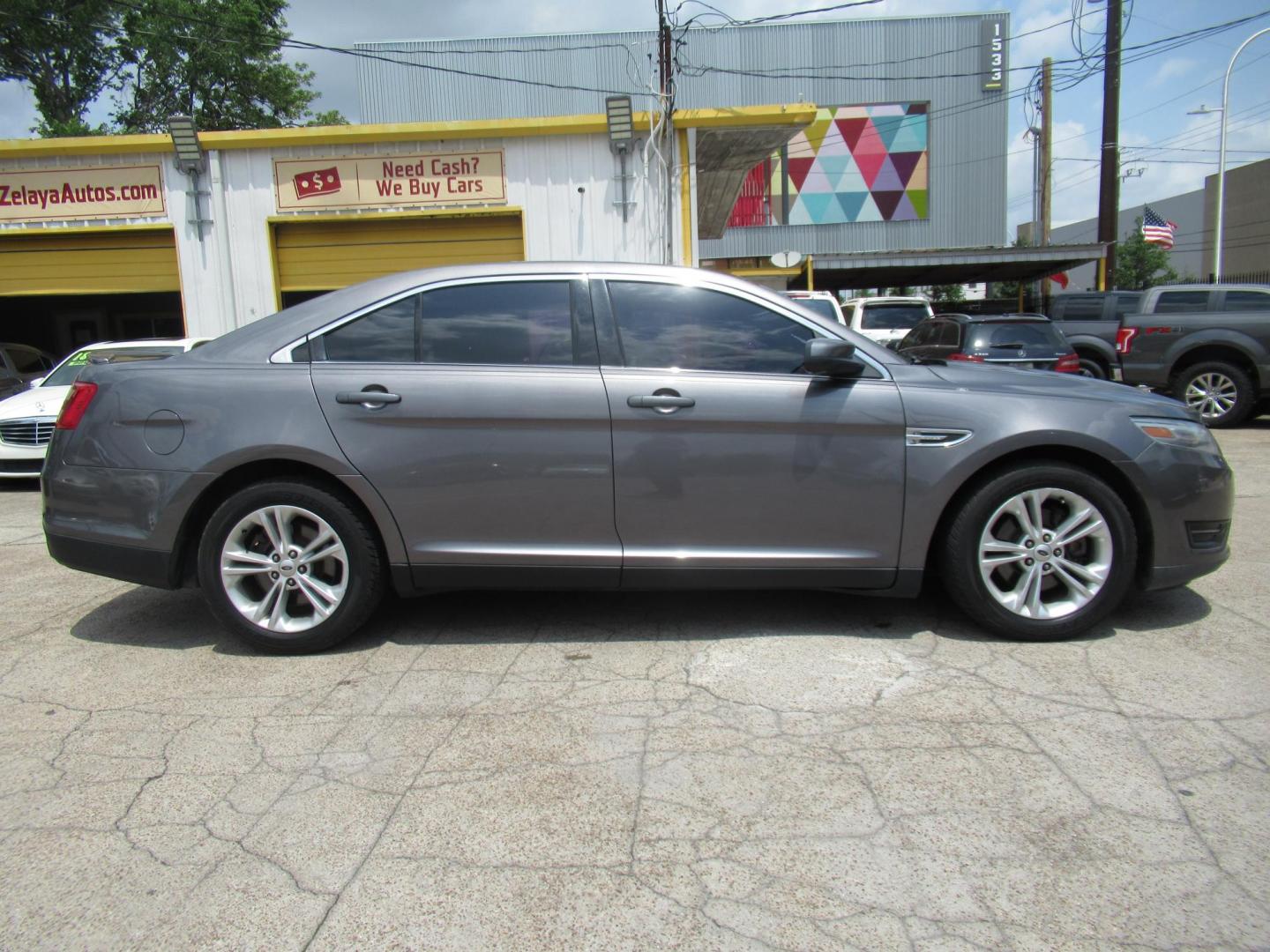2013 Gray /Black Ford Taurus SEL AWD (1FAHP2H86DG) with an 3.5L V6 DOHC 24V engine, Automatic transmission, located at 1511 North Shepherd Dr., Houston, TX, 77008, (281) 657-1221, 29.798361, -95.412560 - 2013 FORD TAURUS SEL VIN: 1FAHP2H86DG164666 1 F A H P 2 H 8 6 D G 1 6 4 6 6 6 SEDAN 4 DR 3.5L V6 F DOHC 24V GASOLINE ALL WHEEL DRIVE - Photo#0