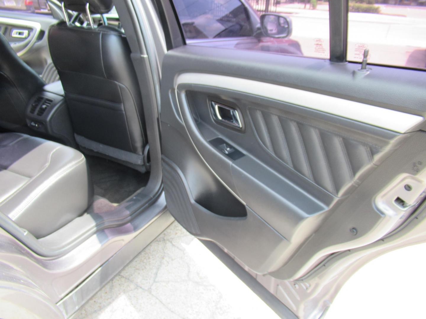 2013 Gray /Black Ford Taurus SEL AWD (1FAHP2H86DG) with an 3.5L V6 DOHC 24V engine, Automatic transmission, located at 1511 North Shepherd Dr., Houston, TX, 77008, (281) 657-1221, 29.798361, -95.412560 - 2013 FORD TAURUS SEL VIN: 1FAHP2H86DG164666 1 F A H P 2 H 8 6 D G 1 6 4 6 6 6 SEDAN 4 DR 3.5L V6 F DOHC 24V GASOLINE ALL WHEEL DRIVE - Photo#10