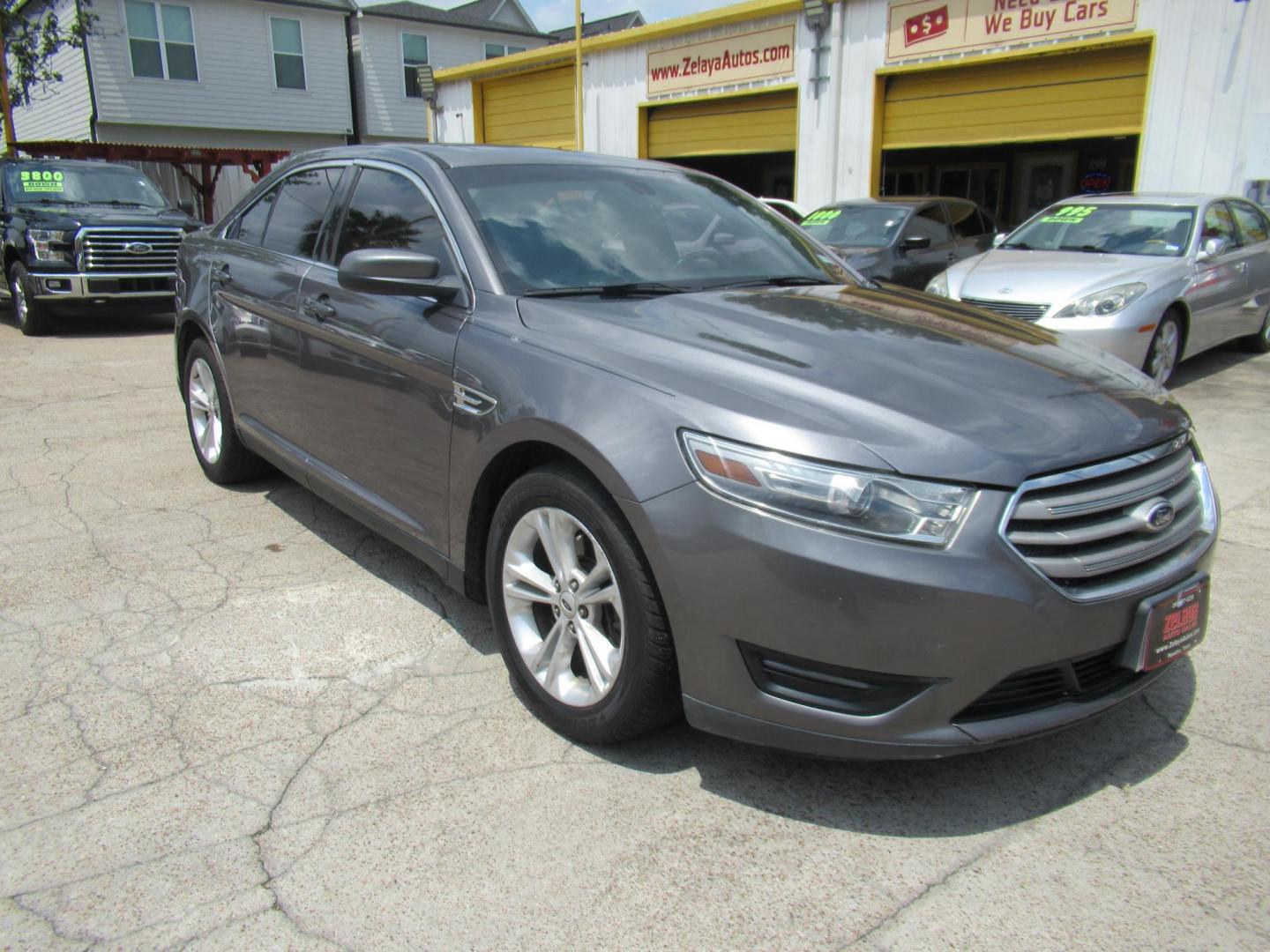 2013 Gray /Black Ford Taurus SEL AWD (1FAHP2H86DG) with an 3.5L V6 DOHC 24V engine, Automatic transmission, located at 1511 North Shepherd Dr., Houston, TX, 77008, (281) 657-1221, 29.798361, -95.412560 - 2013 FORD TAURUS SEL VIN: 1FAHP2H86DG164666 1 F A H P 2 H 8 6 D G 1 6 4 6 6 6 SEDAN 4 DR 3.5L V6 F DOHC 24V GASOLINE ALL WHEEL DRIVE - Photo#15