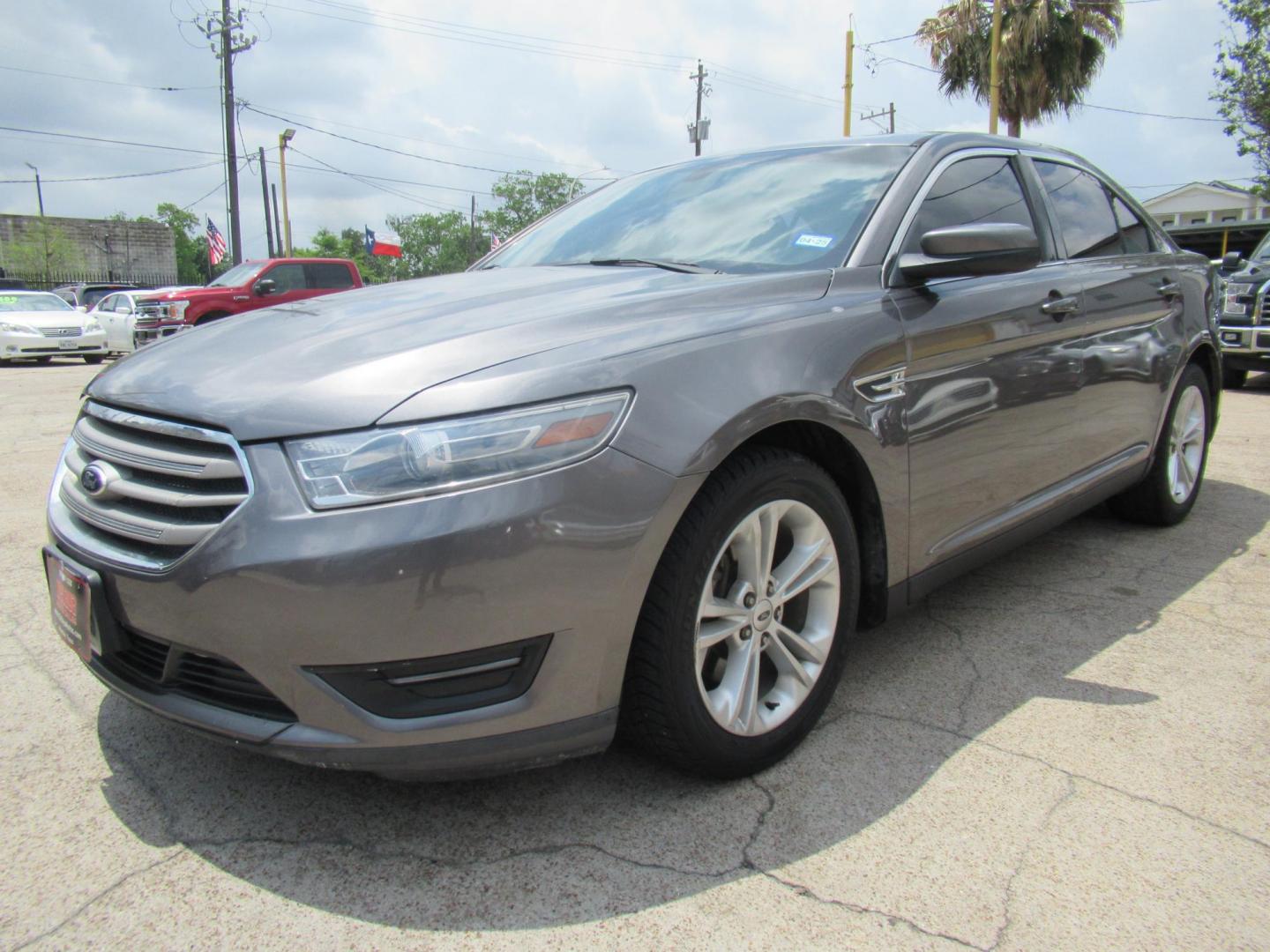 2013 Gray /Black Ford Taurus SEL AWD (1FAHP2H86DG) with an 3.5L V6 DOHC 24V engine, Automatic transmission, located at 1511 North Shepherd Dr., Houston, TX, 77008, (281) 657-1221, 29.798361, -95.412560 - 2013 FORD TAURUS SEL VIN: 1FAHP2H86DG164666 1 F A H P 2 H 8 6 D G 1 6 4 6 6 6 SEDAN 4 DR 3.5L V6 F DOHC 24V GASOLINE ALL WHEEL DRIVE - Photo#16