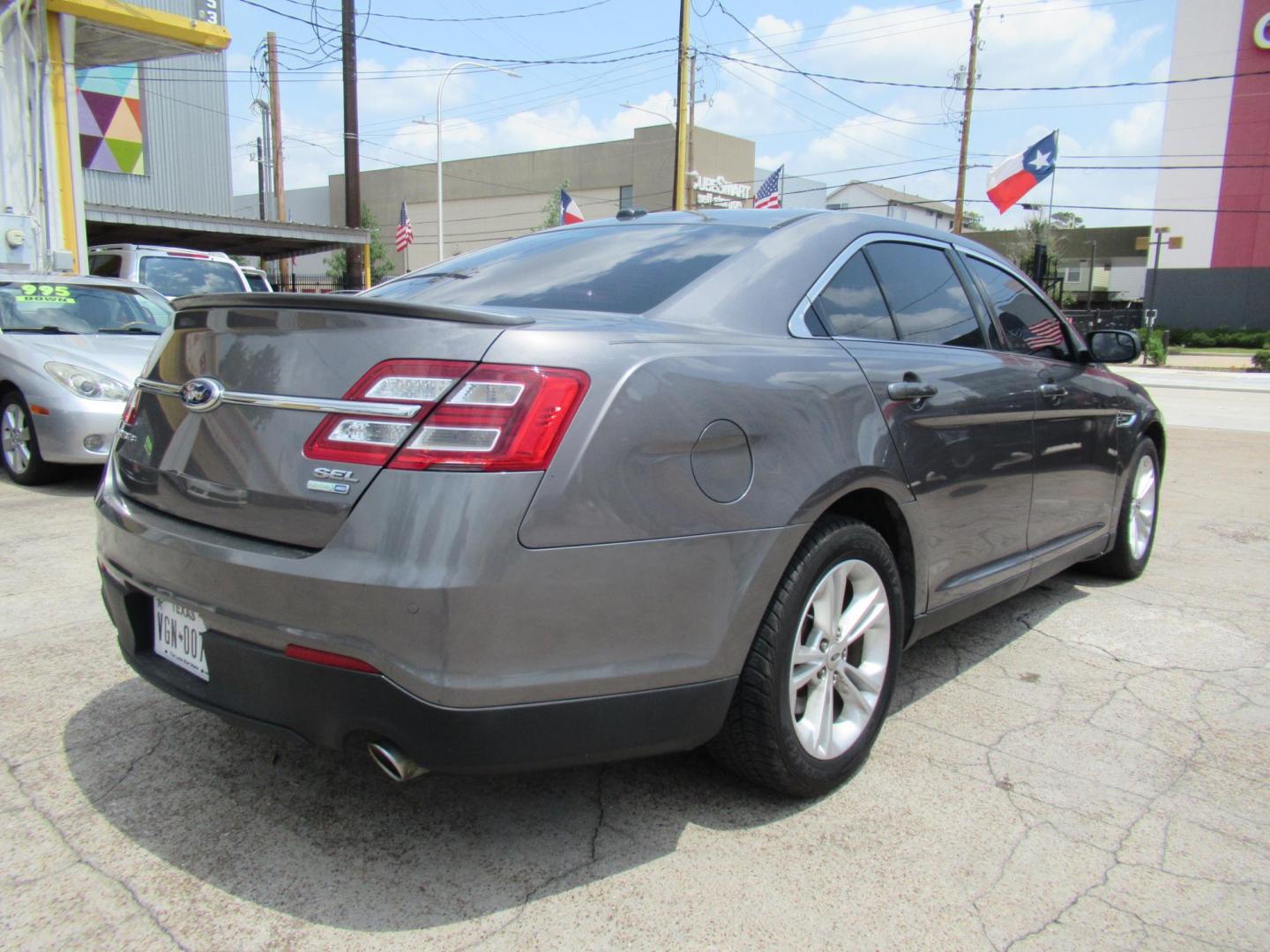 2013 Gray /Black Ford Taurus SEL AWD (1FAHP2H86DG) with an 3.5L V6 DOHC 24V engine, Automatic transmission, located at 1511 North Shepherd Dr., Houston, TX, 77008, (281) 657-1221, 29.798361, -95.412560 - 2013 FORD TAURUS SEL VIN: 1FAHP2H86DG164666 1 F A H P 2 H 8 6 D G 1 6 4 6 6 6 SEDAN 4 DR 3.5L V6 F DOHC 24V GASOLINE ALL WHEEL DRIVE - Photo#19