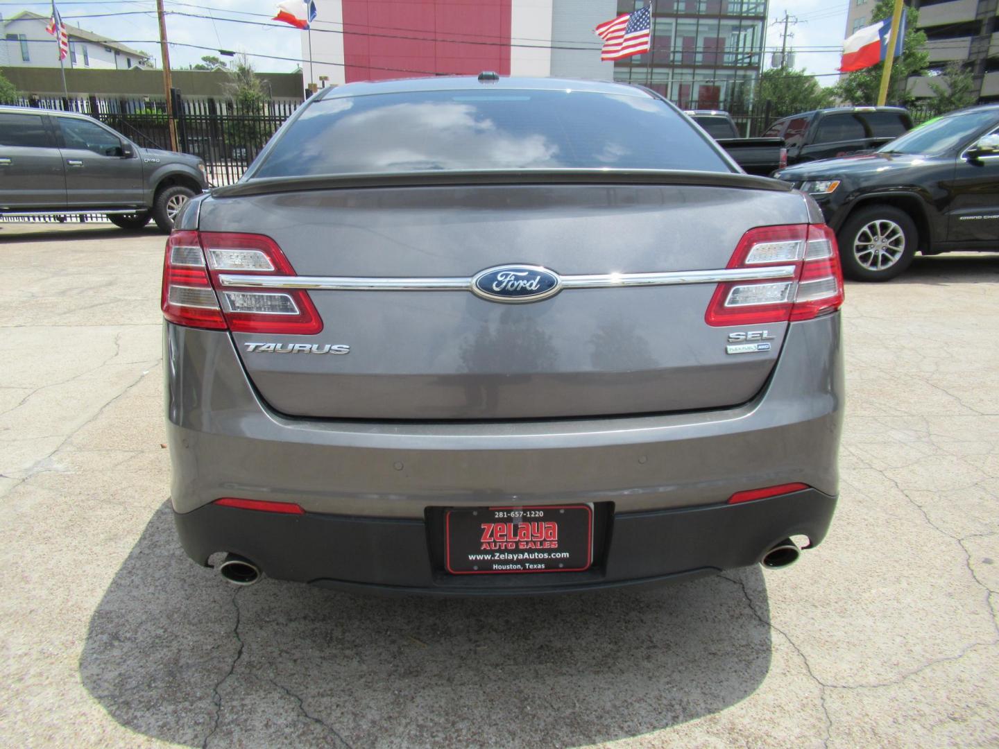 2013 Gray /Black Ford Taurus SEL AWD (1FAHP2H86DG) with an 3.5L V6 DOHC 24V engine, Automatic transmission, located at 1511 North Shepherd Dr., Houston, TX, 77008, (281) 657-1221, 29.798361, -95.412560 - 2013 FORD TAURUS SEL VIN: 1FAHP2H86DG164666 1 F A H P 2 H 8 6 D G 1 6 4 6 6 6 SEDAN 4 DR 3.5L V6 F DOHC 24V GASOLINE ALL WHEEL DRIVE - Photo#22