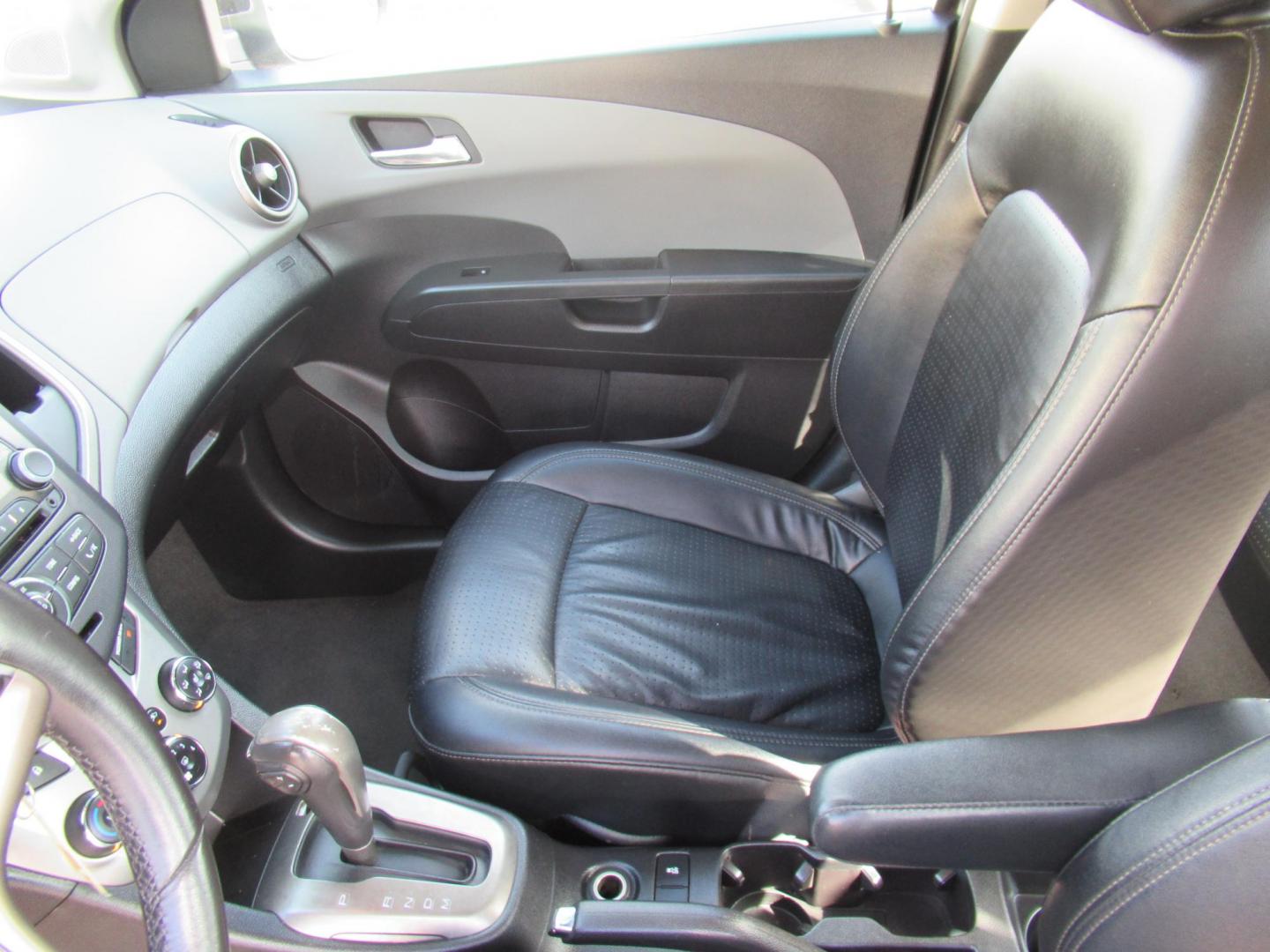 2012 Black /Black Chevrolet Sonic LTZ Sedan (1G1JE5SH0C4) with an 1.8L L4 DOHC 24V FFV engine, Automatic transmission, located at 1511 North Shepherd Dr., Houston, TX, 77008, (281) 657-1221, 29.798361, -95.412560 - 2012 CHEVROLET SONIC LTZ VIN: 1G1JE5SH0C4118352 1 G 1 J E 5 S H 0 C 4 1 1 8 3 5 2 SEDAN 4 DR 1.8L I4 F DOHC 16V GASOLINE FRONT WHEEL DRIVE - Photo#3