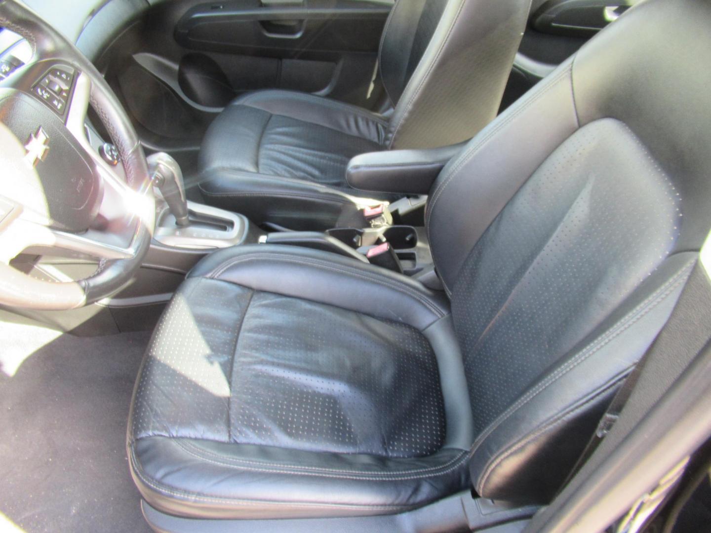 2012 Black /Black Chevrolet Sonic LTZ Sedan (1G1JE5SH0C4) with an 1.8L L4 DOHC 24V FFV engine, Automatic transmission, located at 1511 North Shepherd Dr., Houston, TX, 77008, (281) 657-1221, 29.798361, -95.412560 - 2012 CHEVROLET SONIC LTZ VIN: 1G1JE5SH0C4118352 1 G 1 J E 5 S H 0 C 4 1 1 8 3 5 2 SEDAN 4 DR 1.8L I4 F DOHC 16V GASOLINE FRONT WHEEL DRIVE - Photo#2