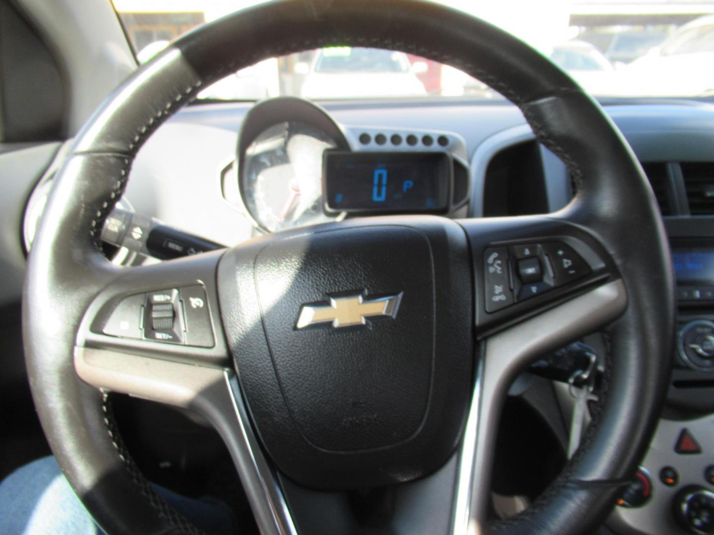 2012 Black /Black Chevrolet Sonic LTZ Sedan (1G1JE5SH0C4) with an 1.8L L4 DOHC 24V FFV engine, Automatic transmission, located at 1511 North Shepherd Dr., Houston, TX, 77008, (281) 657-1221, 29.798361, -95.412560 - 2012 CHEVROLET SONIC LTZ VIN: 1G1JE5SH0C4118352 1 G 1 J E 5 S H 0 C 4 1 1 8 3 5 2 SEDAN 4 DR 1.8L I4 F DOHC 16V GASOLINE FRONT WHEEL DRIVE - Photo#1