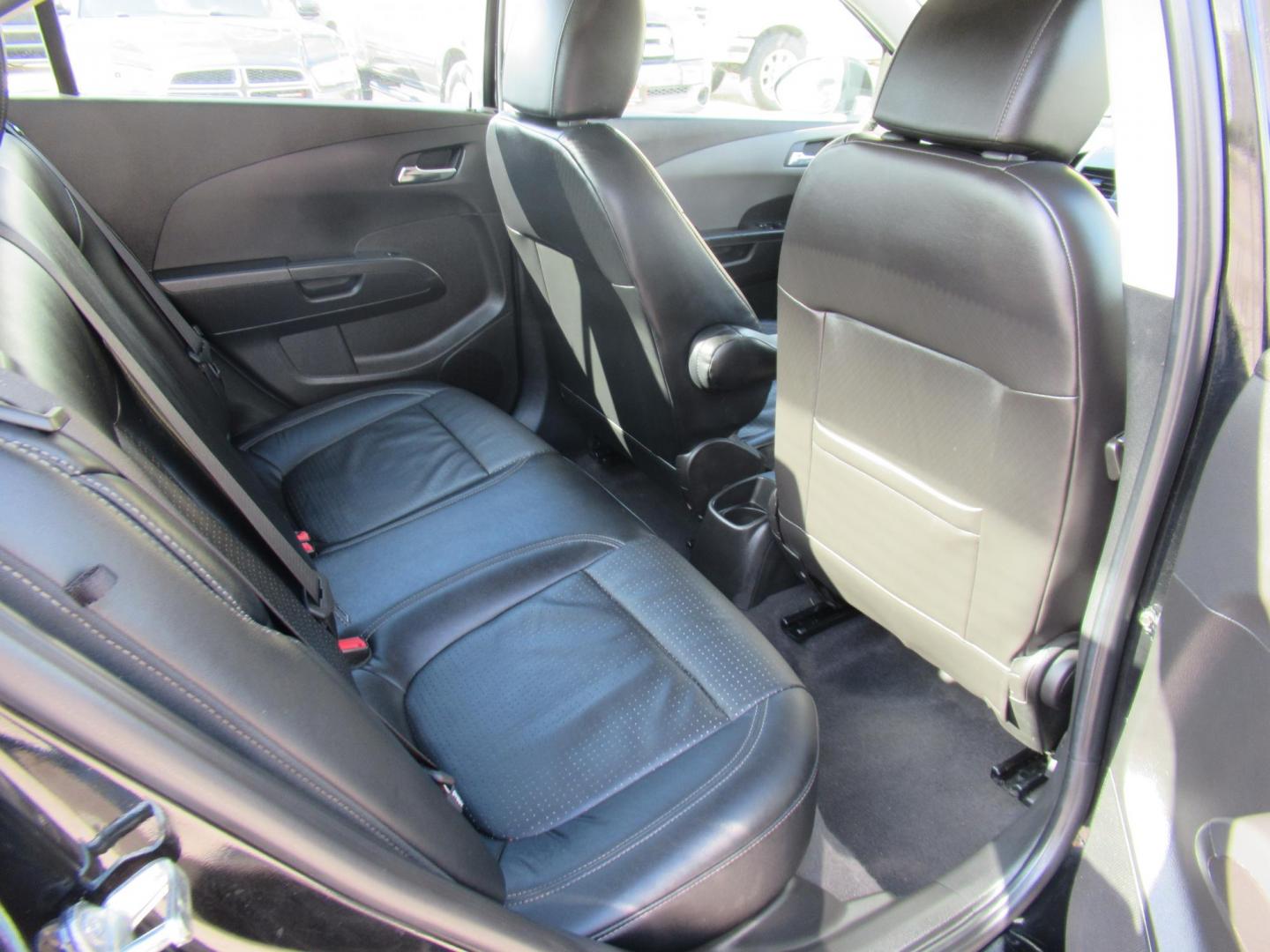 2012 Black /Black Chevrolet Sonic LTZ Sedan (1G1JE5SH0C4) with an 1.8L L4 DOHC 24V FFV engine, Automatic transmission, located at 1511 North Shepherd Dr., Houston, TX, 77008, (281) 657-1221, 29.798361, -95.412560 - 2012 CHEVROLET SONIC LTZ VIN: 1G1JE5SH0C4118352 1 G 1 J E 5 S H 0 C 4 1 1 8 3 5 2 SEDAN 4 DR 1.8L I4 F DOHC 16V GASOLINE FRONT WHEEL DRIVE - Photo#8