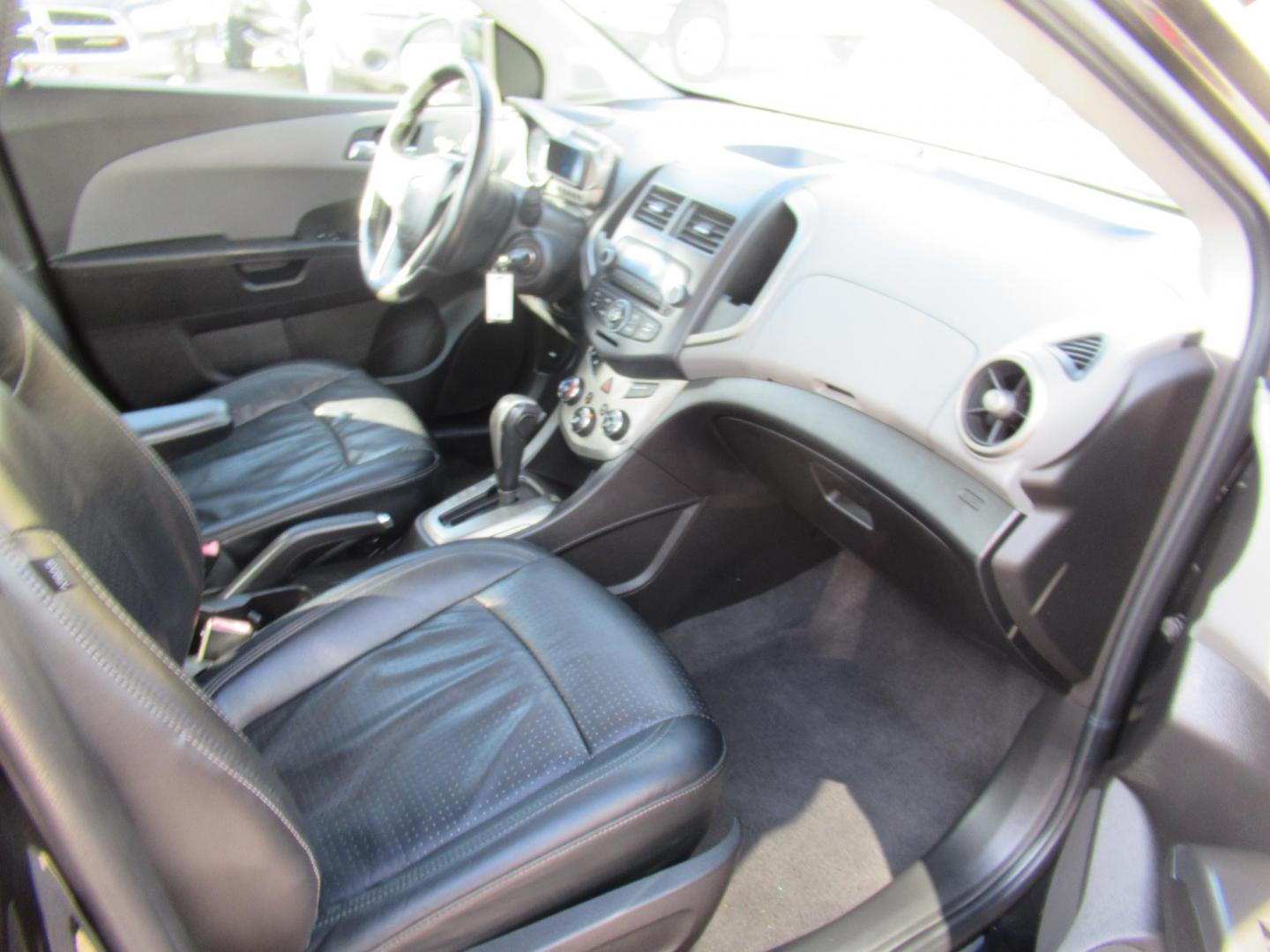 2012 Black /Black Chevrolet Sonic LTZ Sedan (1G1JE5SH0C4) with an 1.8L L4 DOHC 24V FFV engine, Automatic transmission, located at 1511 North Shepherd Dr., Houston, TX, 77008, (281) 657-1221, 29.798361, -95.412560 - 2012 CHEVROLET SONIC LTZ VIN: 1G1JE5SH0C4118352 1 G 1 J E 5 S H 0 C 4 1 1 8 3 5 2 SEDAN 4 DR 1.8L I4 F DOHC 16V GASOLINE FRONT WHEEL DRIVE - Photo#10