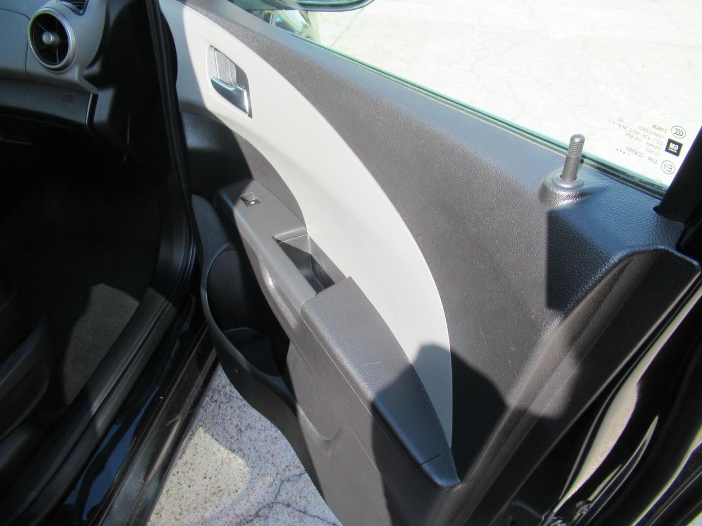 2012 Black /Black Chevrolet Sonic LTZ Sedan (1G1JE5SH0C4) with an 1.8L L4 DOHC 24V FFV engine, Automatic transmission, located at 1511 North Shepherd Dr., Houston, TX, 77008, (281) 657-1221, 29.798361, -95.412560 - 2012 CHEVROLET SONIC LTZ VIN: 1G1JE5SH0C4118352 1 G 1 J E 5 S H 0 C 4 1 1 8 3 5 2 SEDAN 4 DR 1.8L I4 F DOHC 16V GASOLINE FRONT WHEEL DRIVE - Photo#11