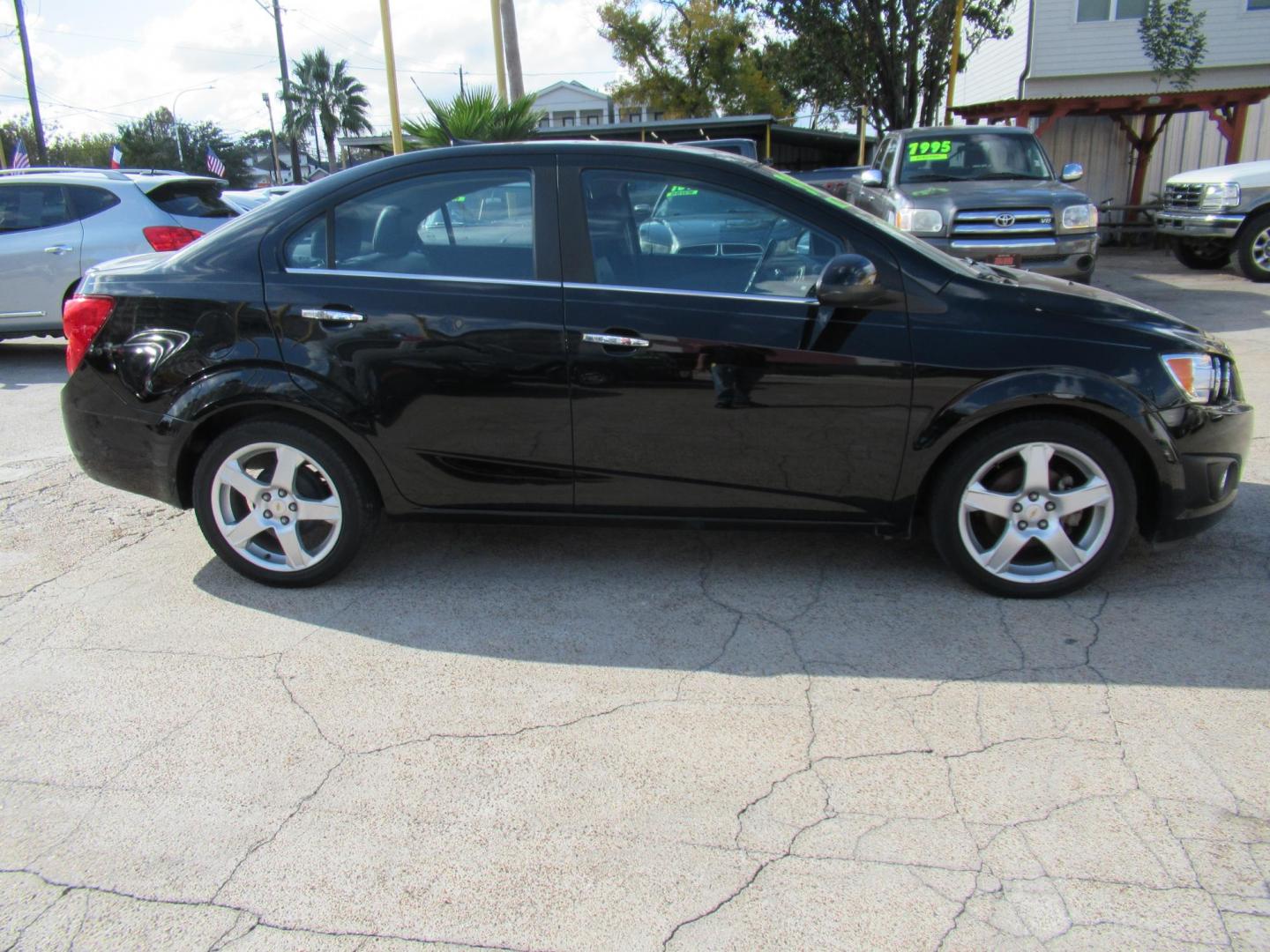2012 Black /Black Chevrolet Sonic LTZ Sedan (1G1JE5SH0C4) with an 1.8L L4 DOHC 24V FFV engine, Automatic transmission, located at 1511 North Shepherd Dr., Houston, TX, 77008, (281) 657-1221, 29.798361, -95.412560 - 2012 CHEVROLET SONIC LTZ VIN: 1G1JE5SH0C4118352 1 G 1 J E 5 S H 0 C 4 1 1 8 3 5 2 SEDAN 4 DR 1.8L I4 F DOHC 16V GASOLINE FRONT WHEEL DRIVE - Photo#12