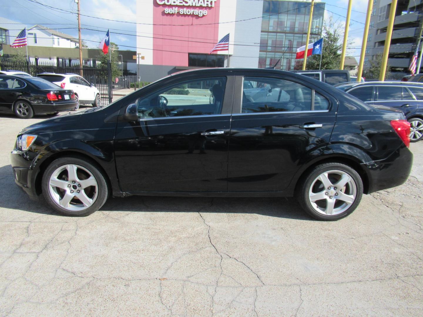 2012 Black /Black Chevrolet Sonic LTZ Sedan (1G1JE5SH0C4) with an 1.8L L4 DOHC 24V FFV engine, Automatic transmission, located at 1511 North Shepherd Dr., Houston, TX, 77008, (281) 657-1221, 29.798361, -95.412560 - 2012 CHEVROLET SONIC LTZ VIN: 1G1JE5SH0C4118352 1 G 1 J E 5 S H 0 C 4 1 1 8 3 5 2 SEDAN 4 DR 1.8L I4 F DOHC 16V GASOLINE FRONT WHEEL DRIVE - Photo#15