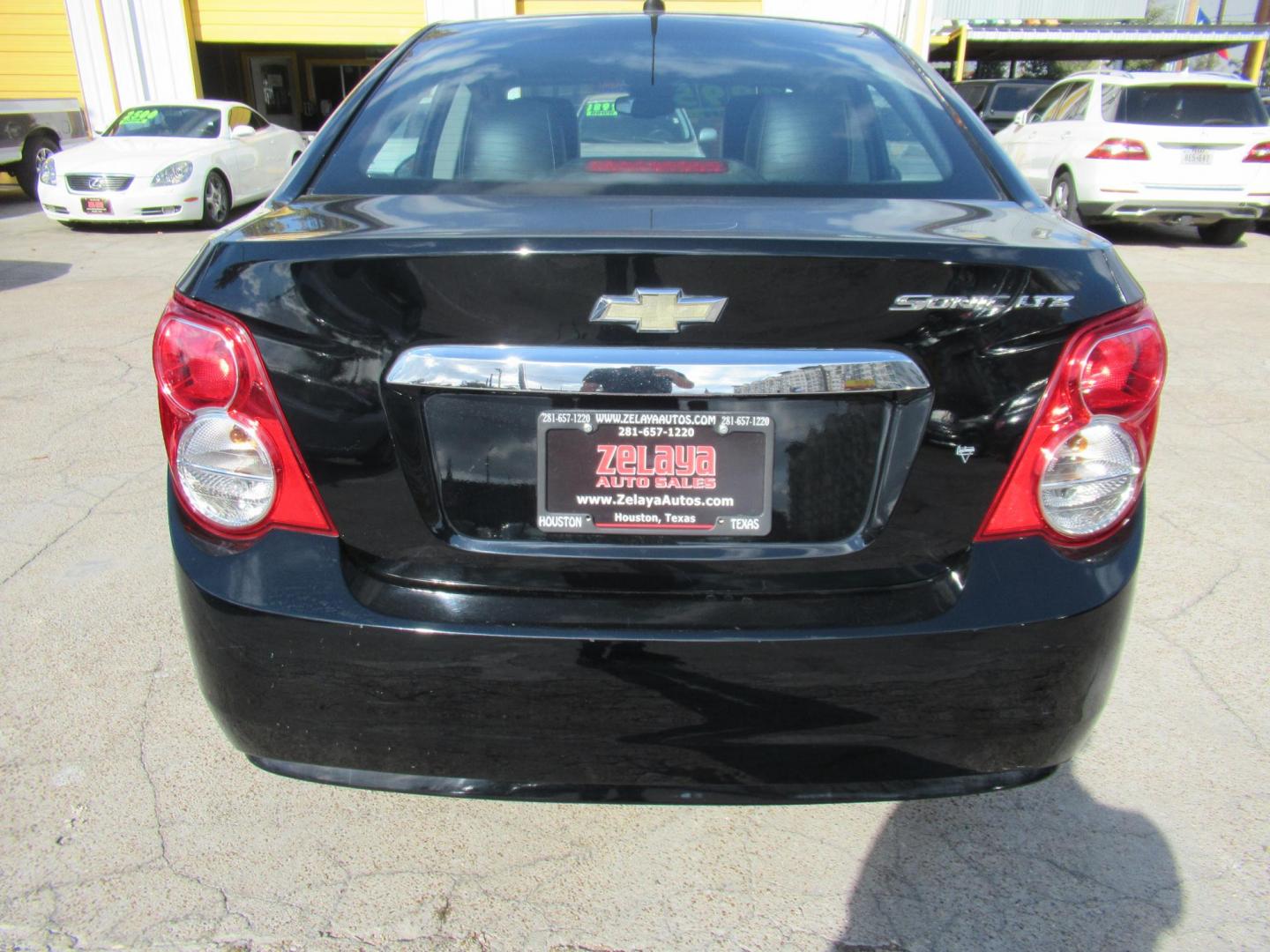 2012 Black /Black Chevrolet Sonic LTZ Sedan (1G1JE5SH0C4) with an 1.8L L4 DOHC 24V FFV engine, Automatic transmission, located at 1511 North Shepherd Dr., Houston, TX, 77008, (281) 657-1221, 29.798361, -95.412560 - 2012 CHEVROLET SONIC LTZ VIN: 1G1JE5SH0C4118352 1 G 1 J E 5 S H 0 C 4 1 1 8 3 5 2 SEDAN 4 DR 1.8L I4 F DOHC 16V GASOLINE FRONT WHEEL DRIVE - Photo#17